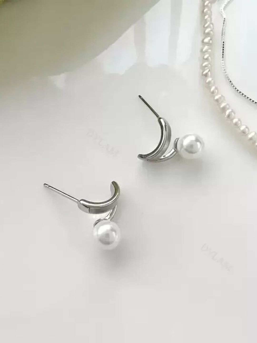 

KRYSTALZ Silver-Plated Contemporary Stud Earrings
