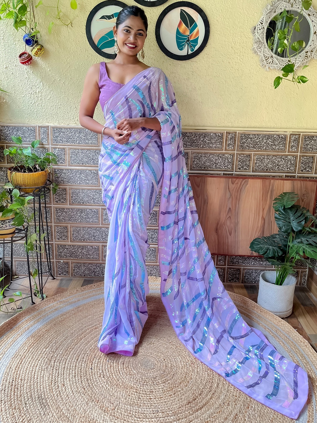 

Mitera Lavender & Blue Embellished Sequinned Pure Georgette Saree