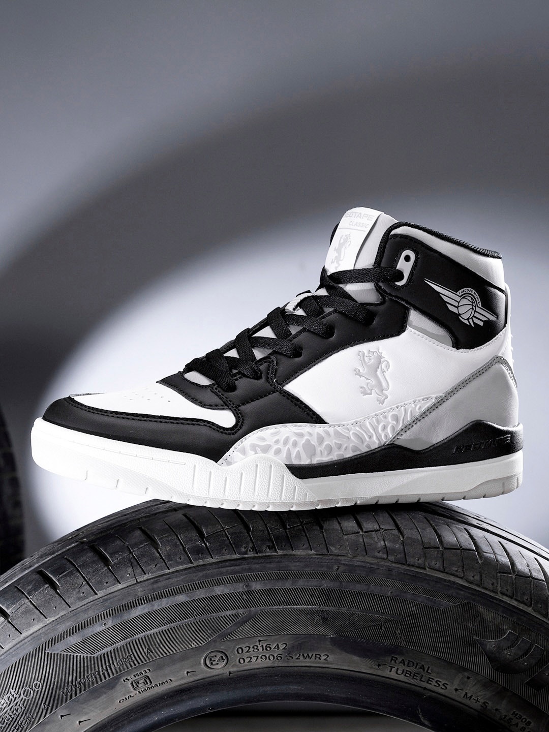 

Red Tape Men Mid Top Solid Sneakers, White