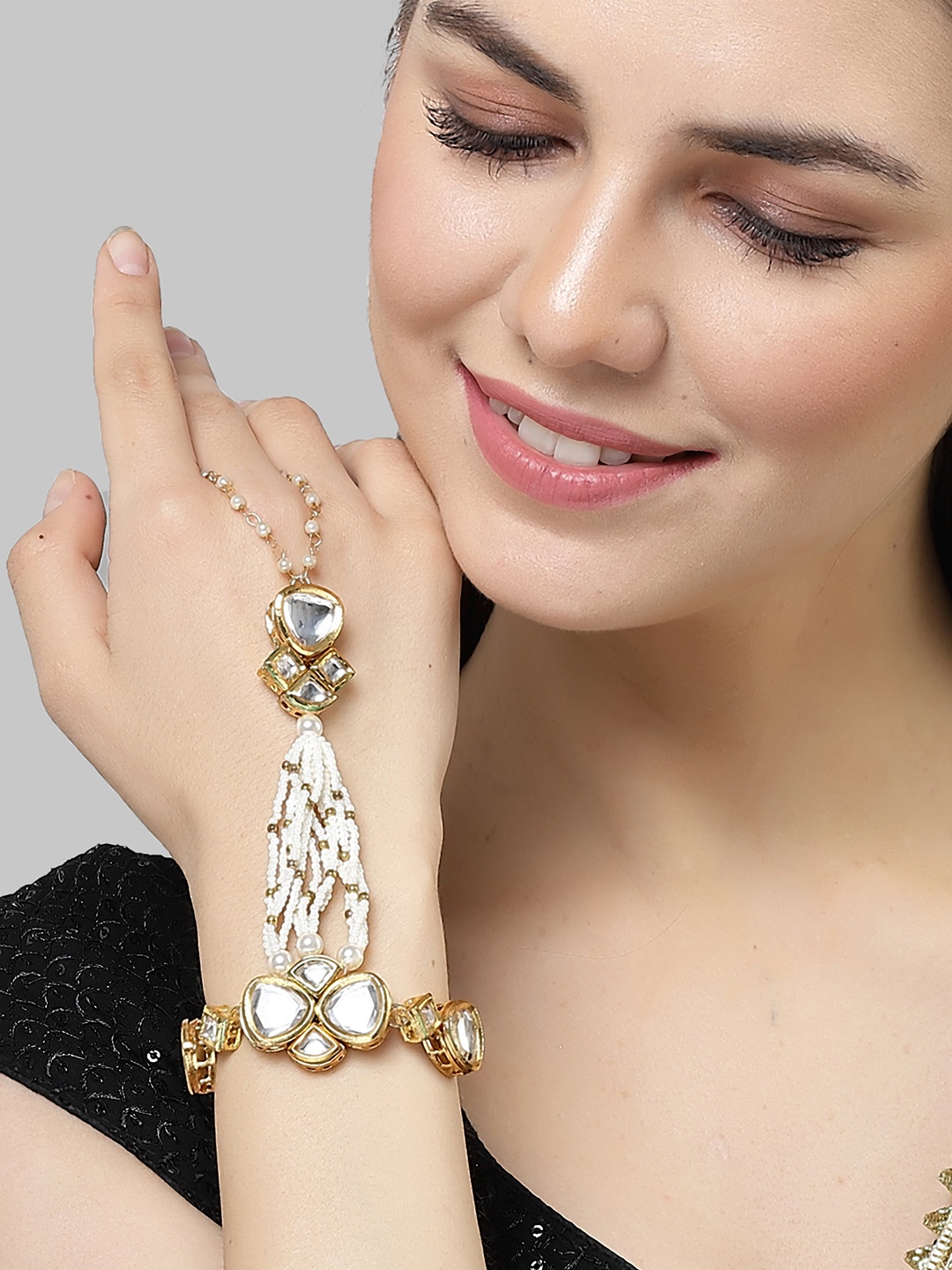 

KARATCART Women Gold-Plated Kundan Studded And Beaded Hathphool