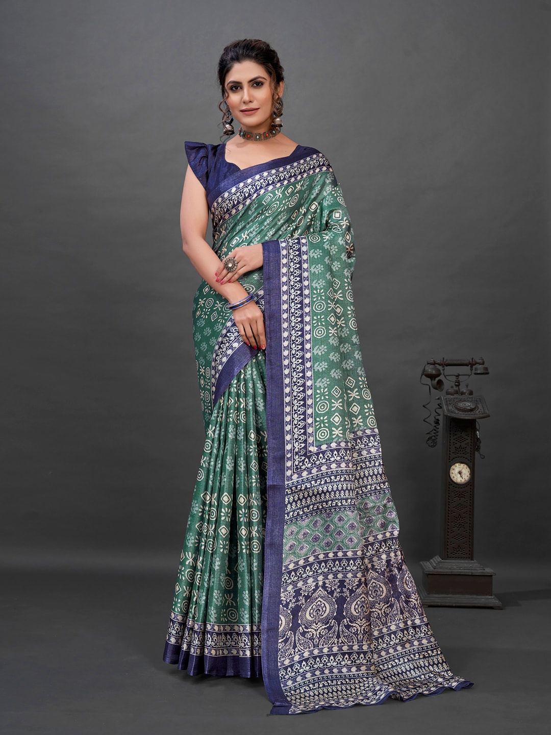 

Anouk Sea Green & Navy Blue Ethnic Motifs Printed Brasso Saree