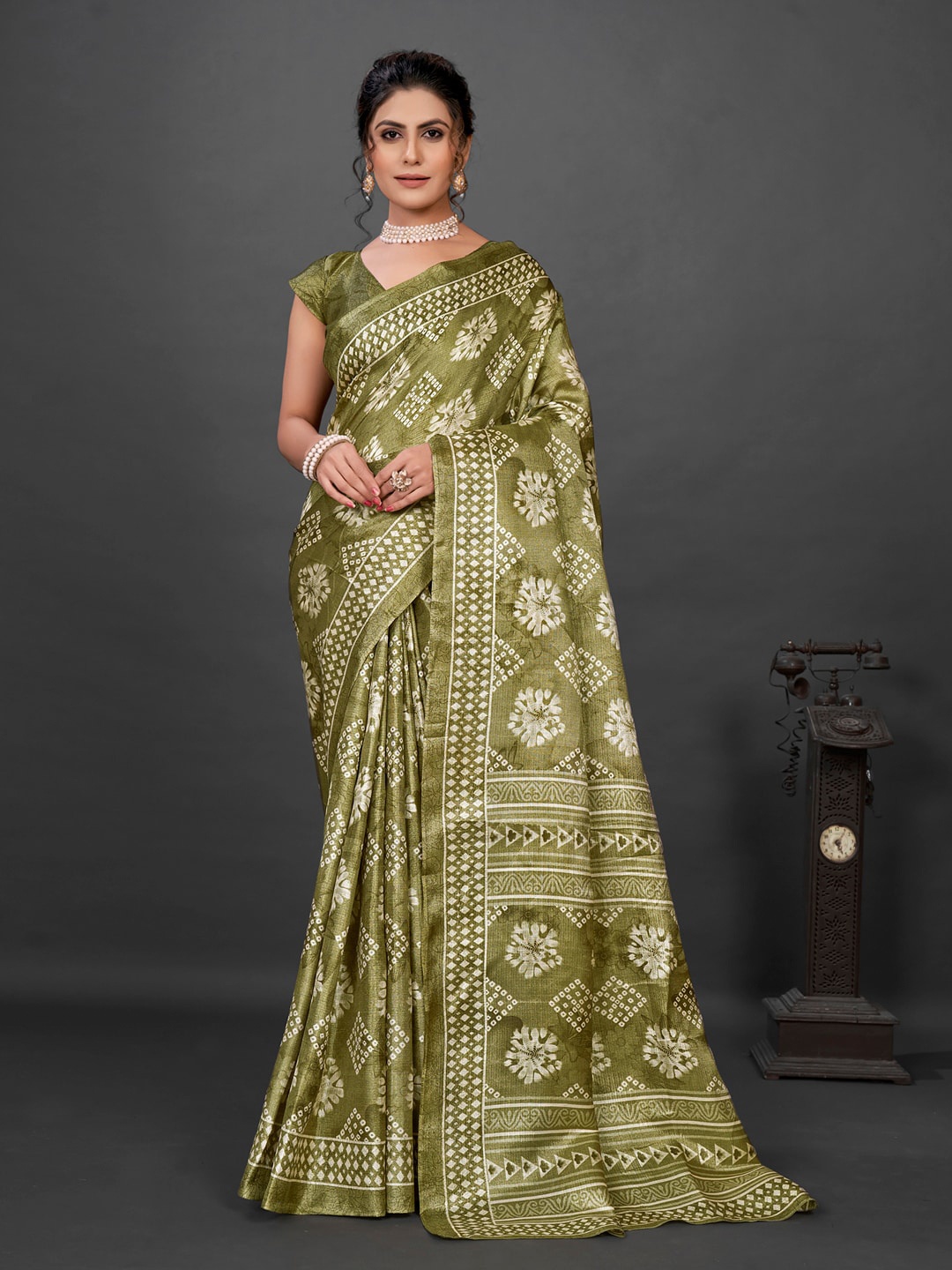 

Anouk Ethnic Motifs Printed Brasso Bagru Saree, Olive