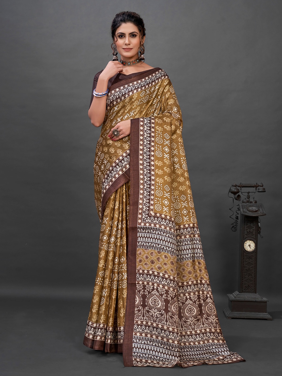 

Anouk Mustard & Brown Ethnic Motifs Printed Brasso Bagru Saree