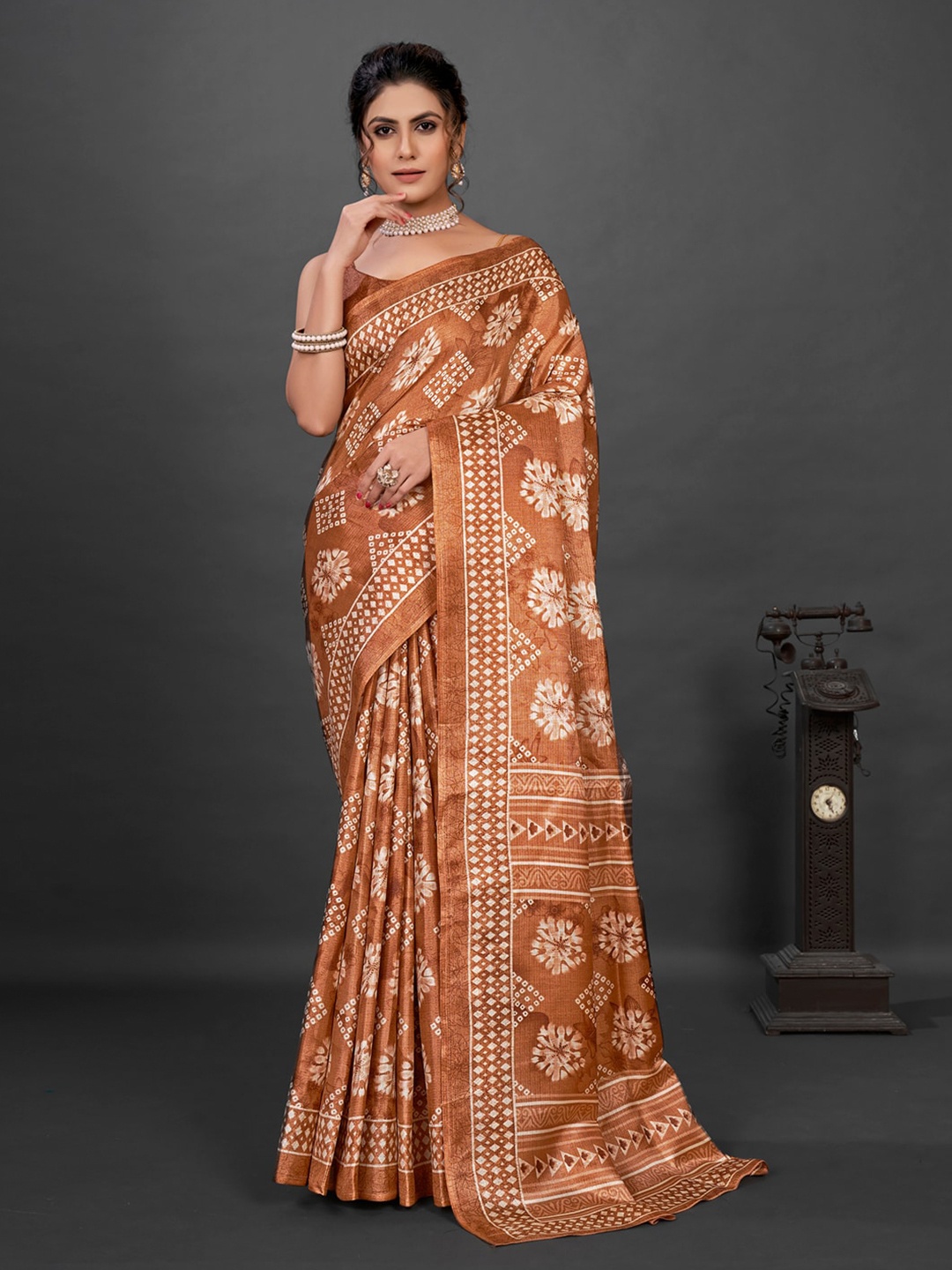 

Anouk Brown and White Ethnic Motifs Printed Bagru Saree