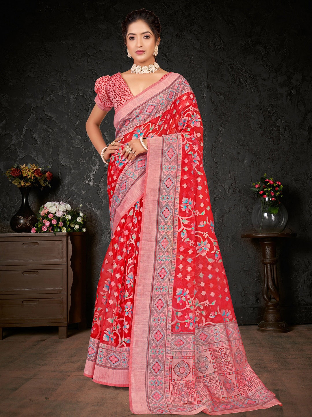 

Anouk Red & Pink Ethnic Motifs Brasso Chanderi Saree