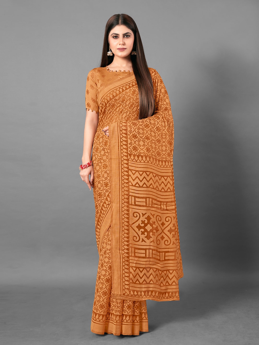 

Anouk Brown Ethnic Motifs Printed Brasso Chanderi Saree