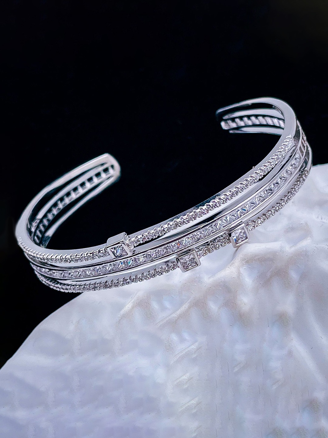 

ZIVOM Brass Cubic Zirconia Silver-Plated Cuff Bracelet
