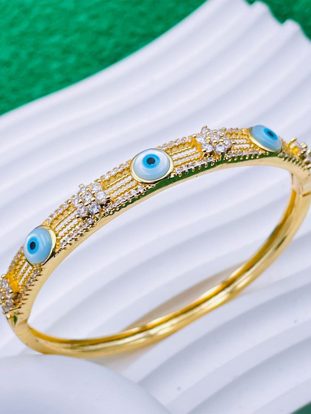 

ZIVOM Gold-Plated Cubic Zirconia Bangle-Style Bracelet