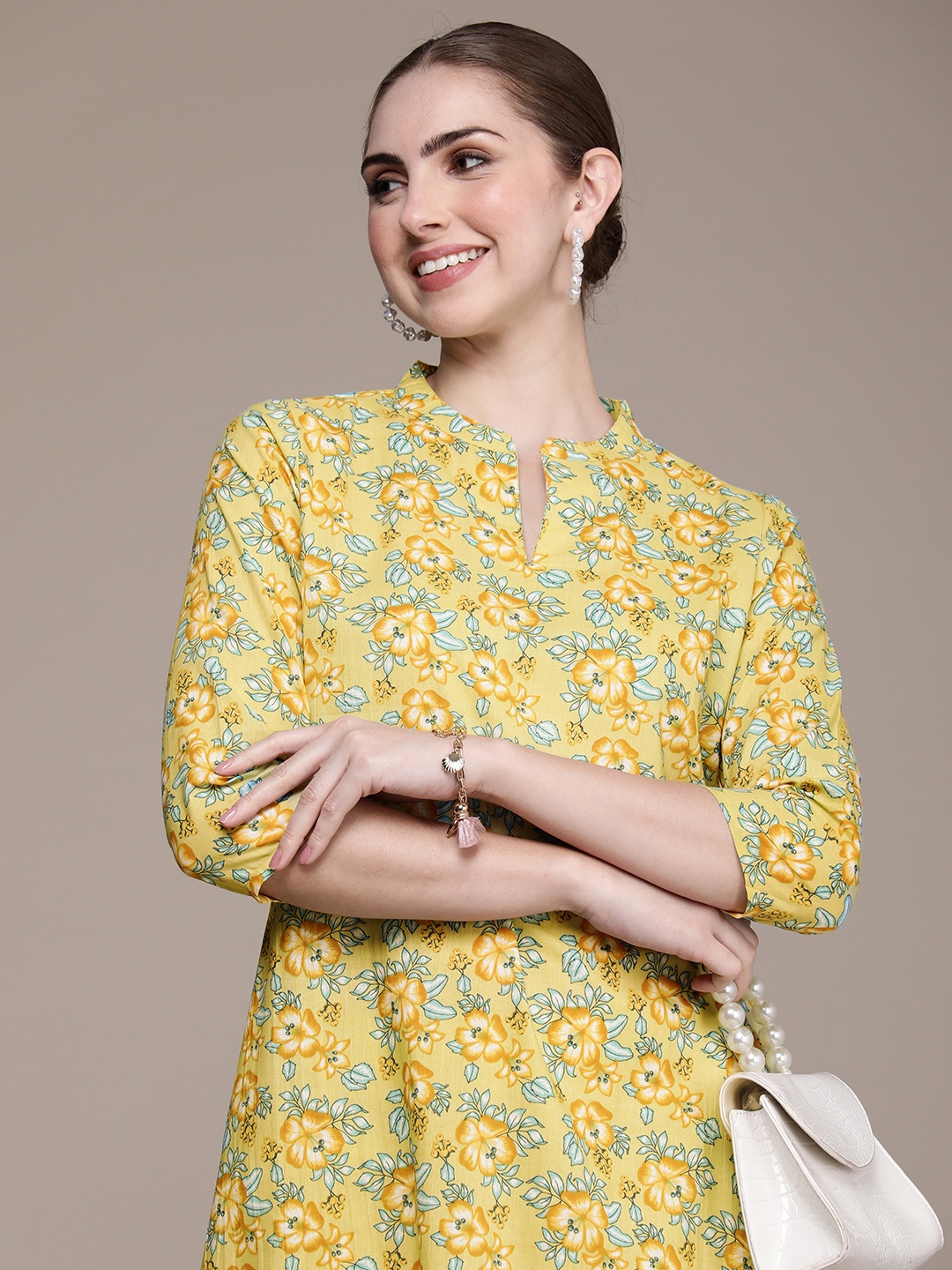 

Anouk Women Floral Printed Regular Pure Cotton Kurta with Trousers, Yellow