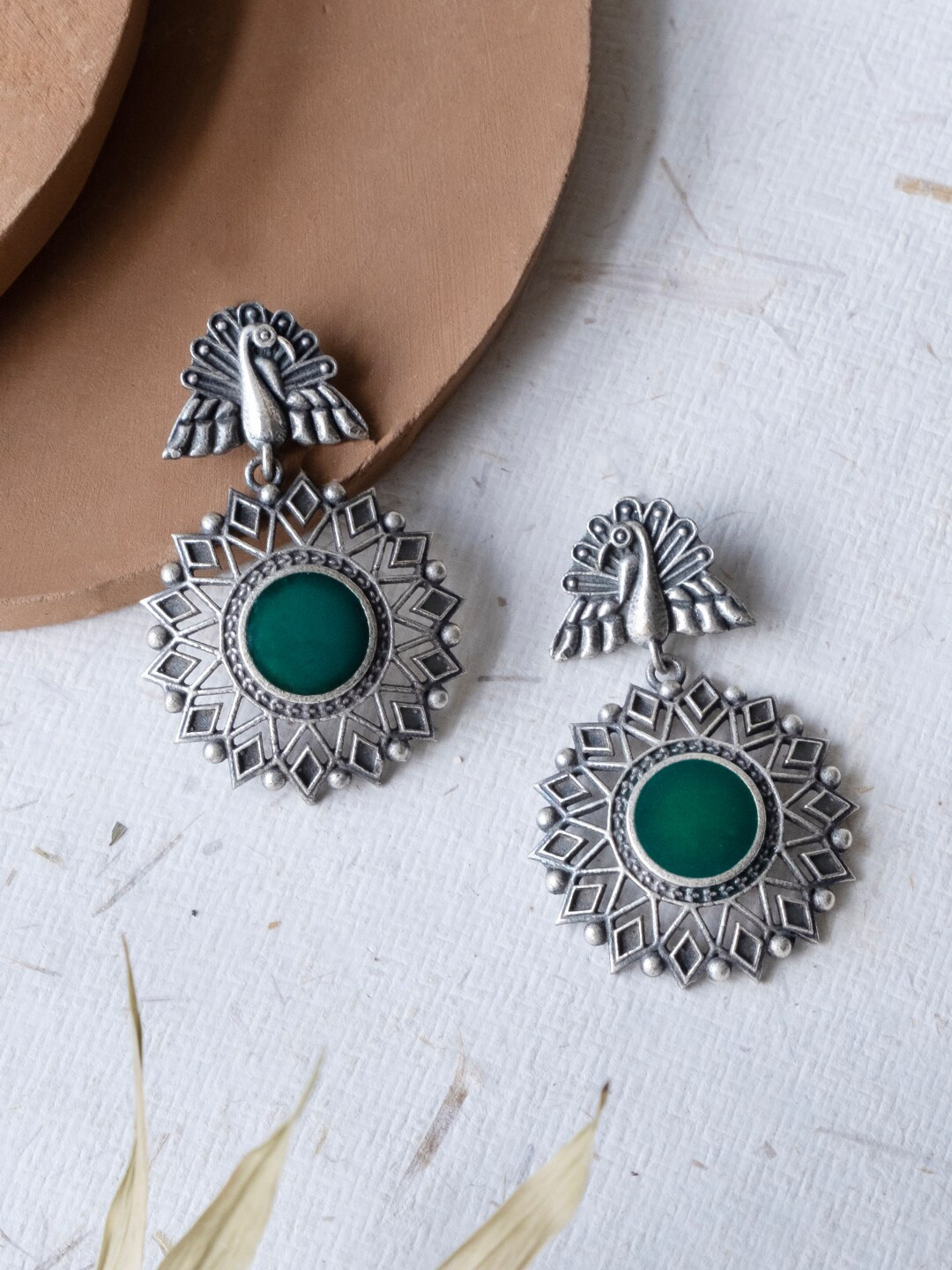 

Infuzze Silver-Plated Peacock Shaped Drop Earrings