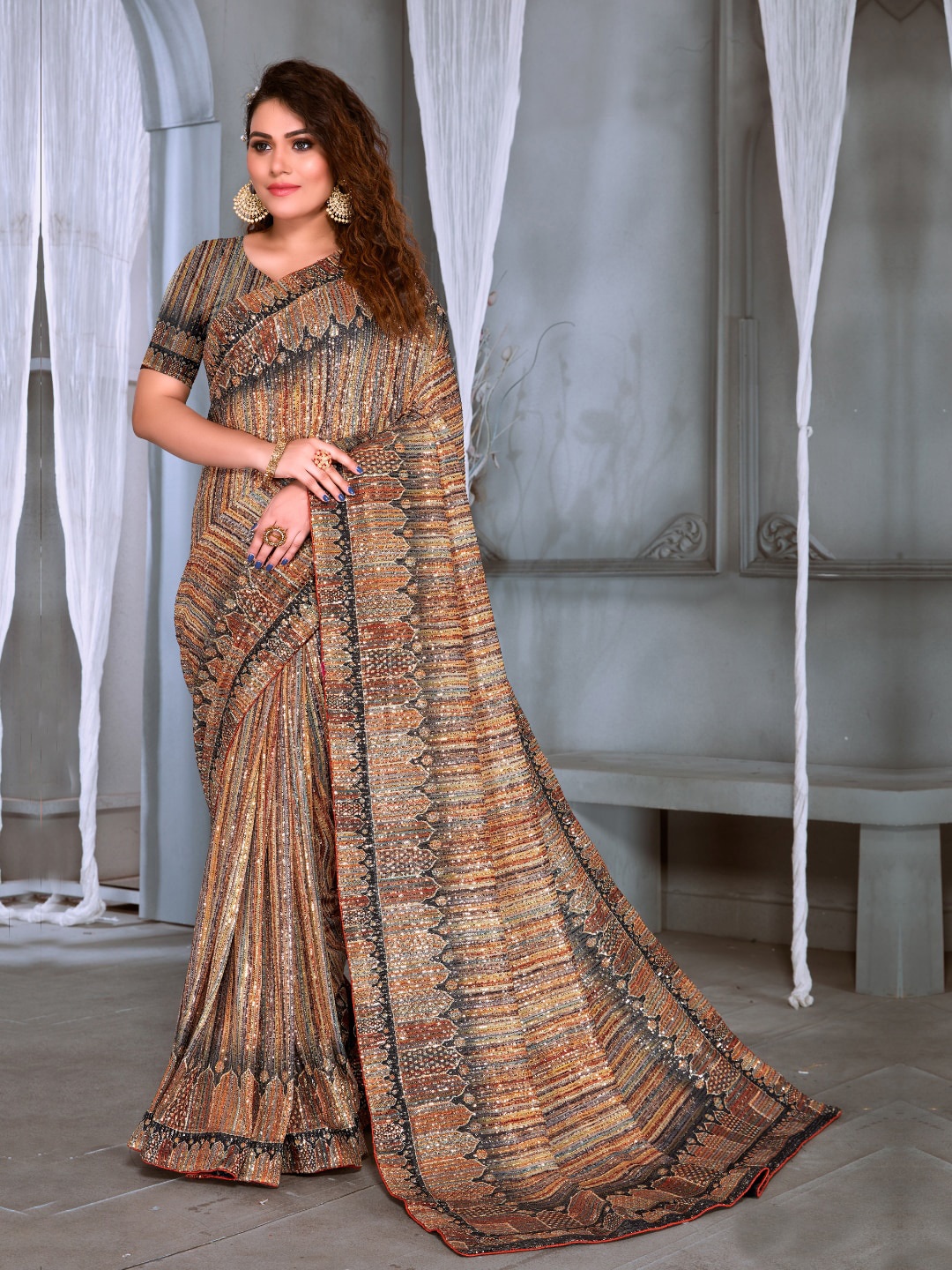 

Chhabra 555 Striped Sequinned Lycra Sarees, Brown
