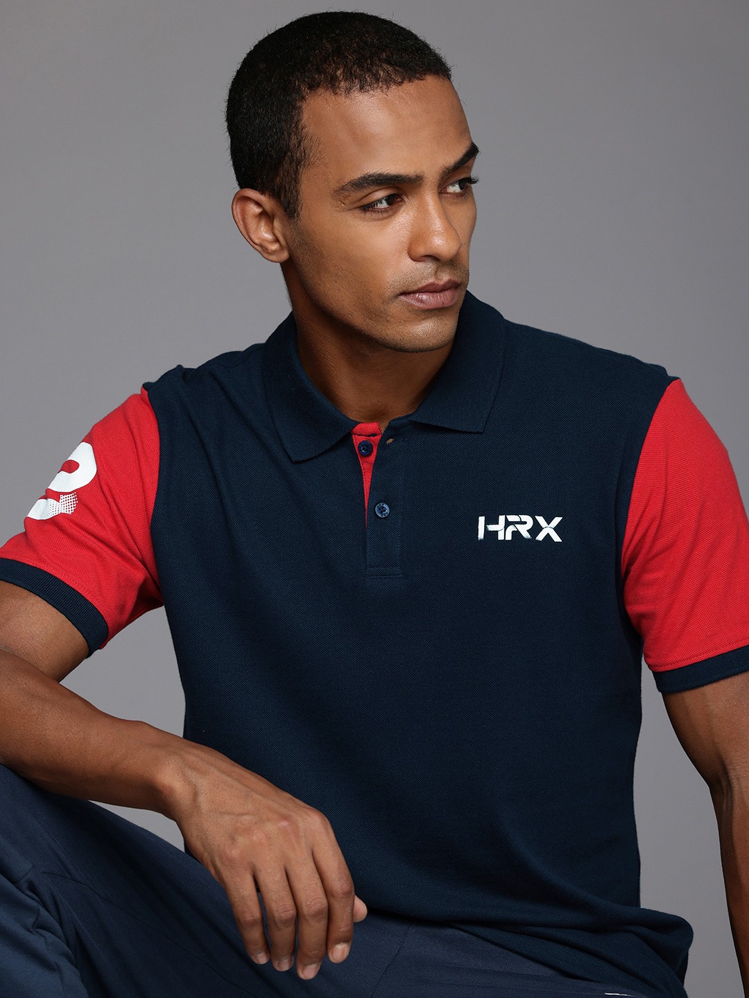 

HRX by Hrithik Roshan Men Self Design Polo Collar T-shirt, Navy blue