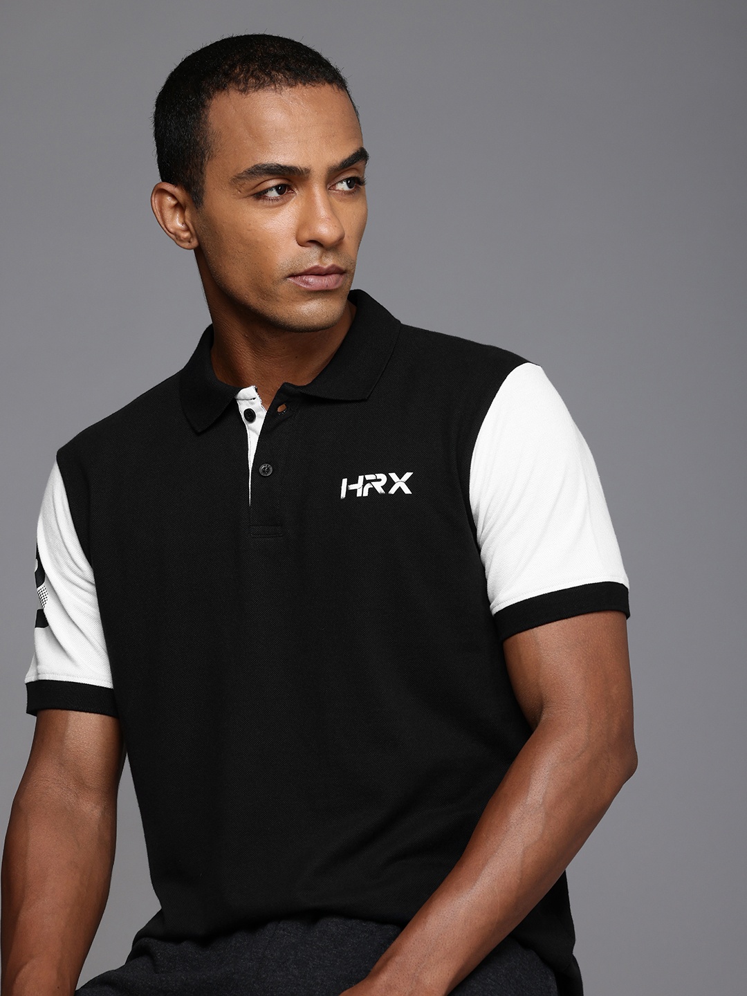 

HRX by Hrithik Roshan Men Self Design Polo Collar T-shirt, Black
