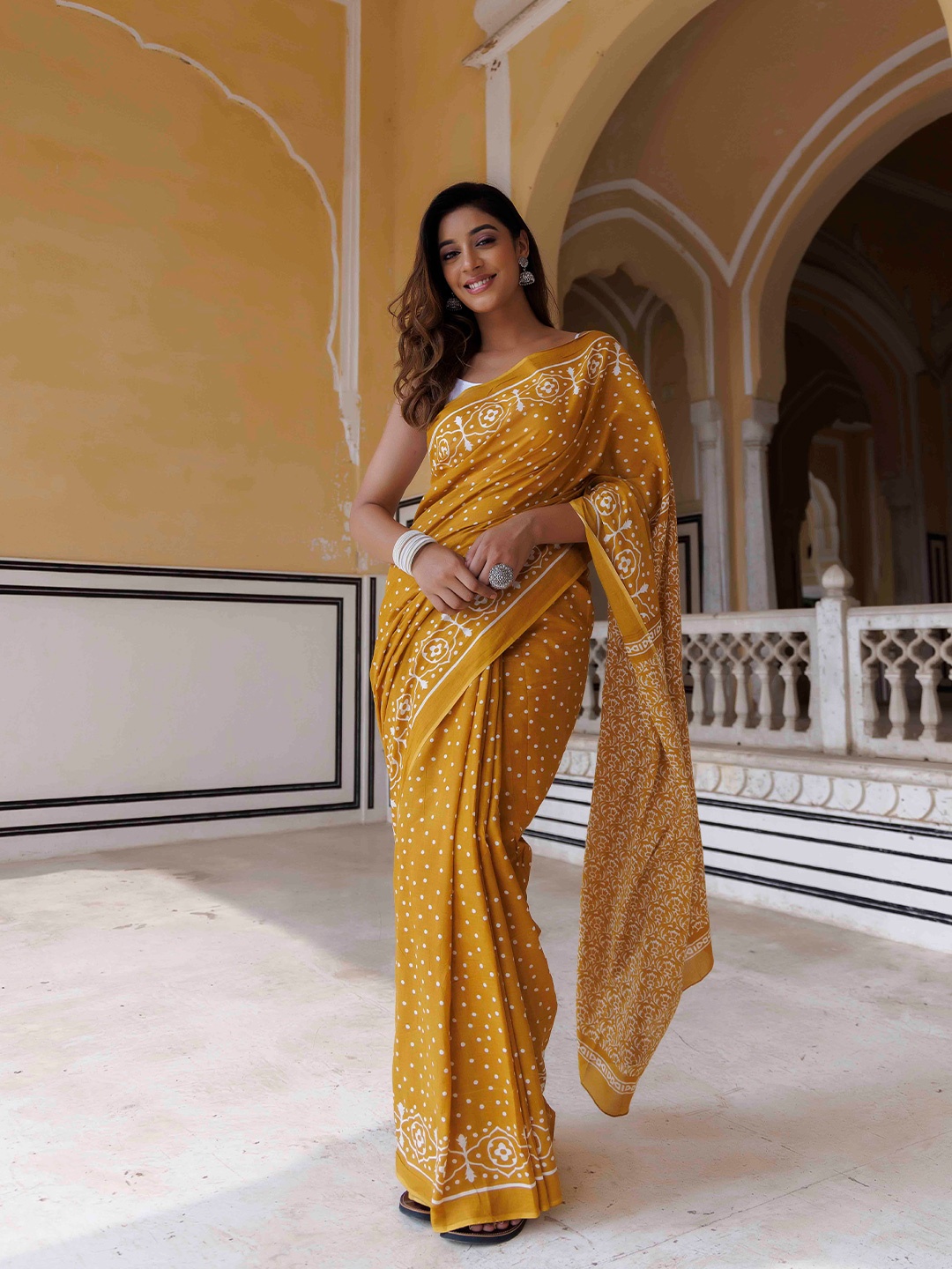 

Ragavi Ethnic Motifs Printed Pure Cotton Saree, Mustard