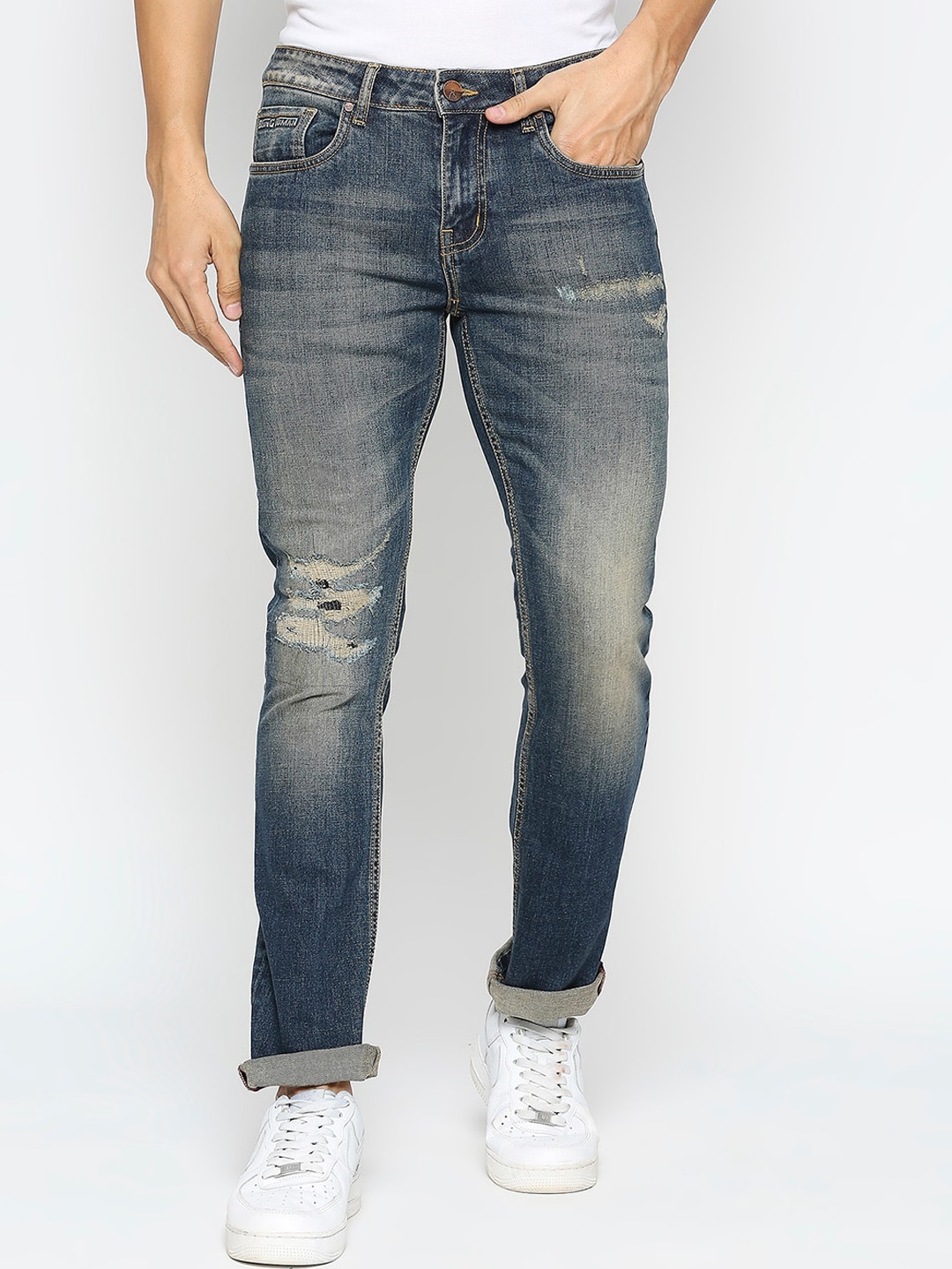 

Being Human Men Mid-Rise Mildly Distressed Heavy Fade Jeans, Blue