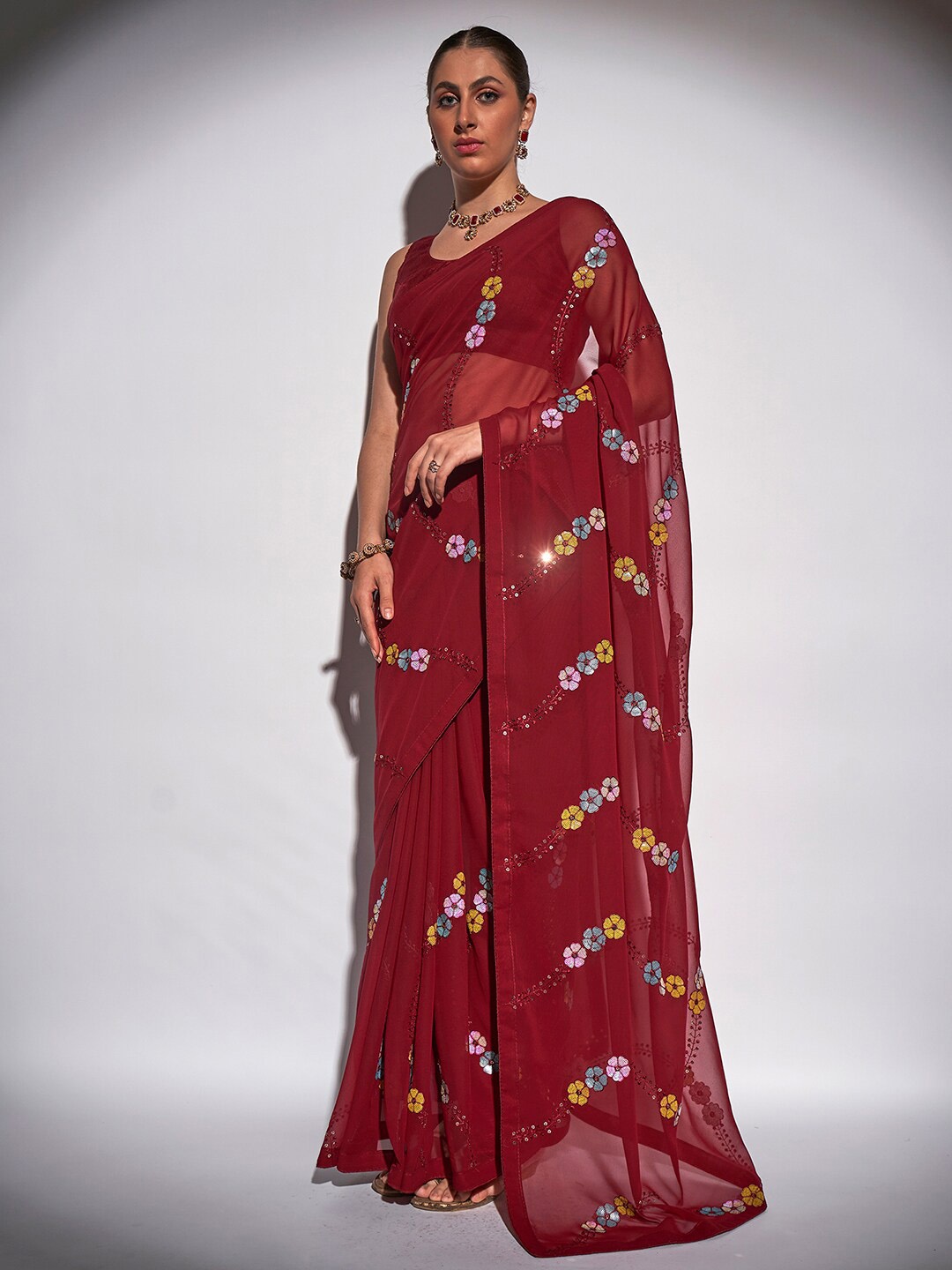 

Mitera Maroon & Yellow Floral Embellished Sequinned Pure Georgette Saree