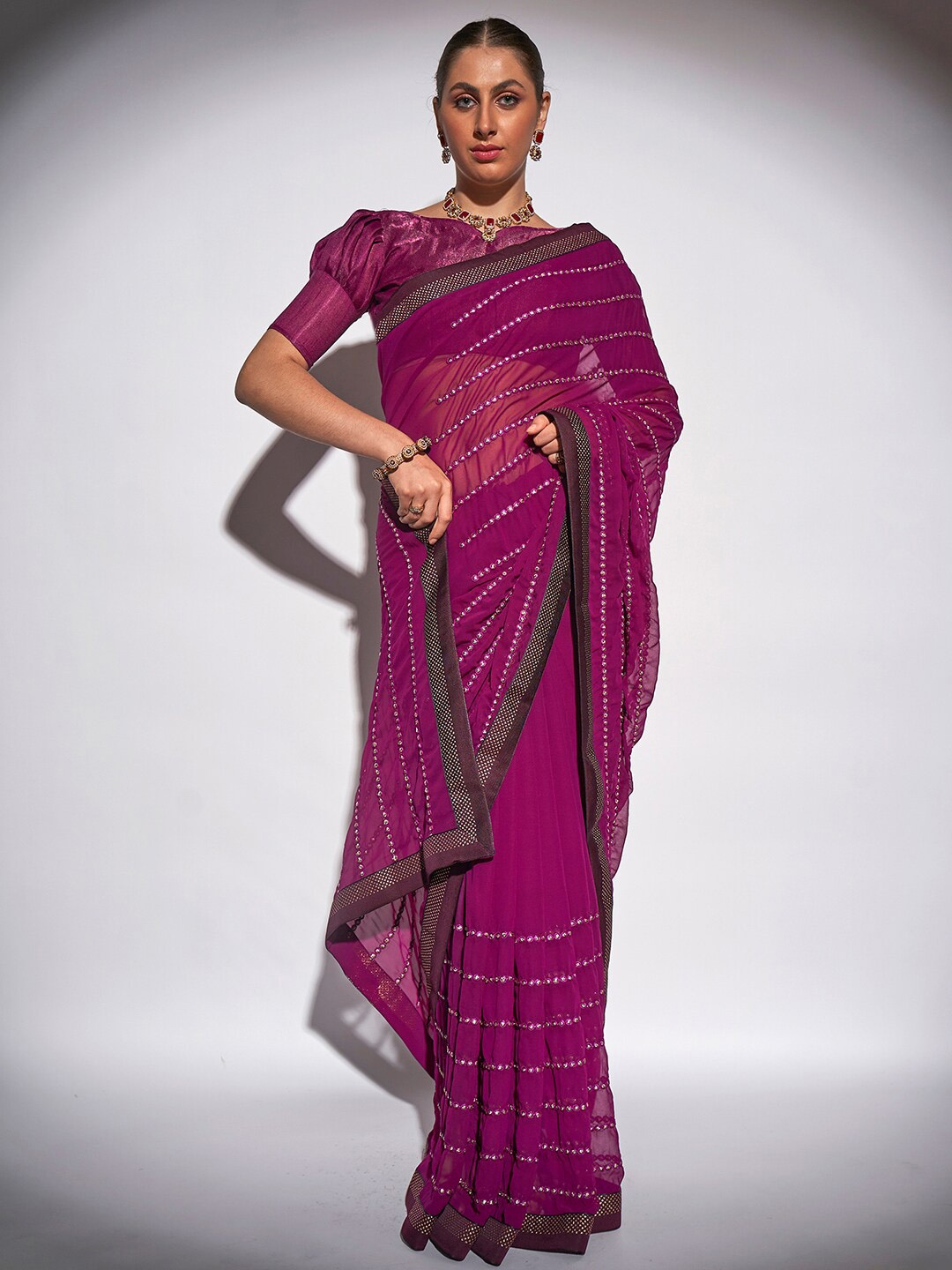

Mitera Purple Embellished Sequinned Pure Georgette Saree