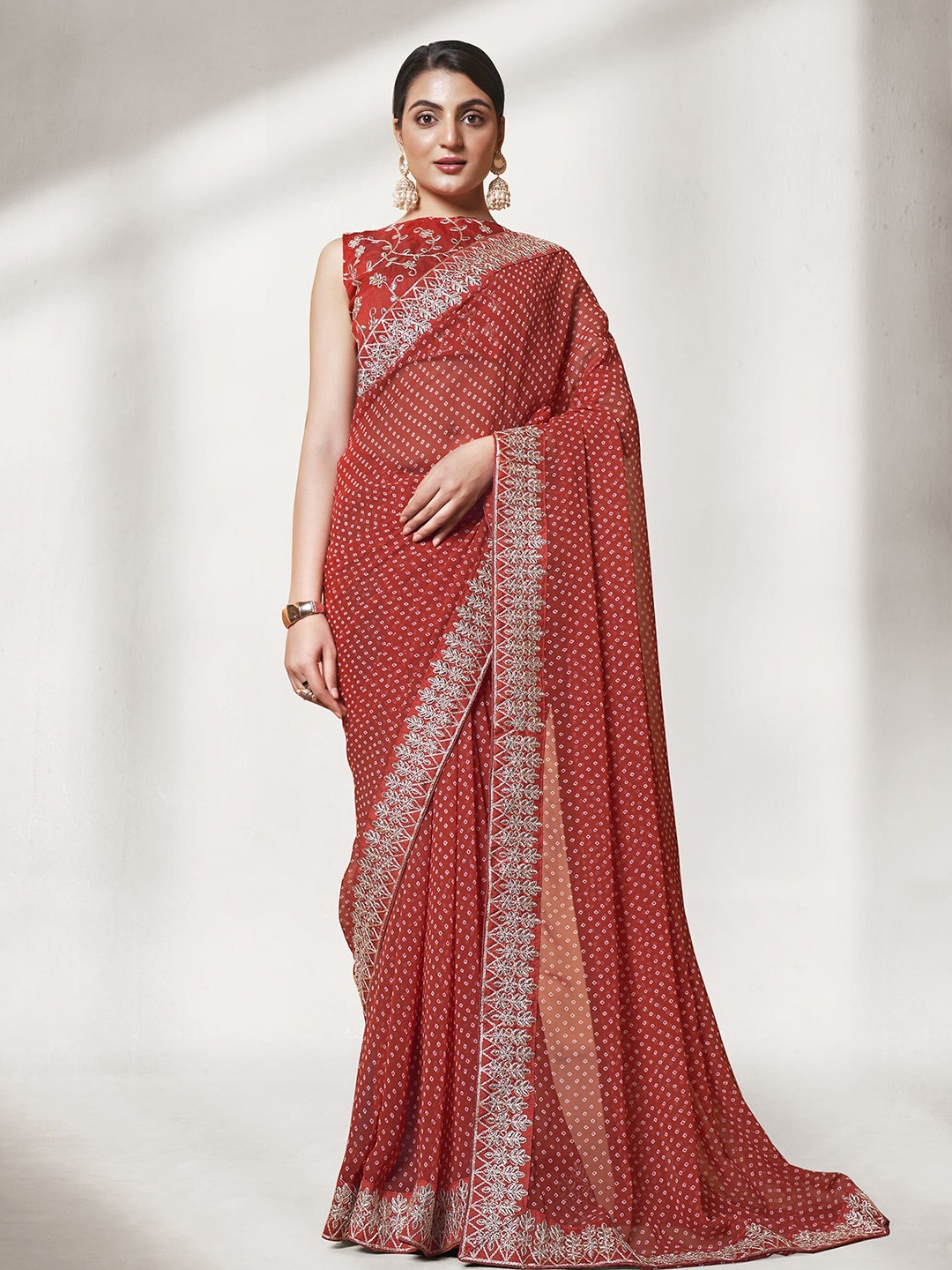 

Mitera Maroon & White Bandhani Printed Pure Georgette Saree