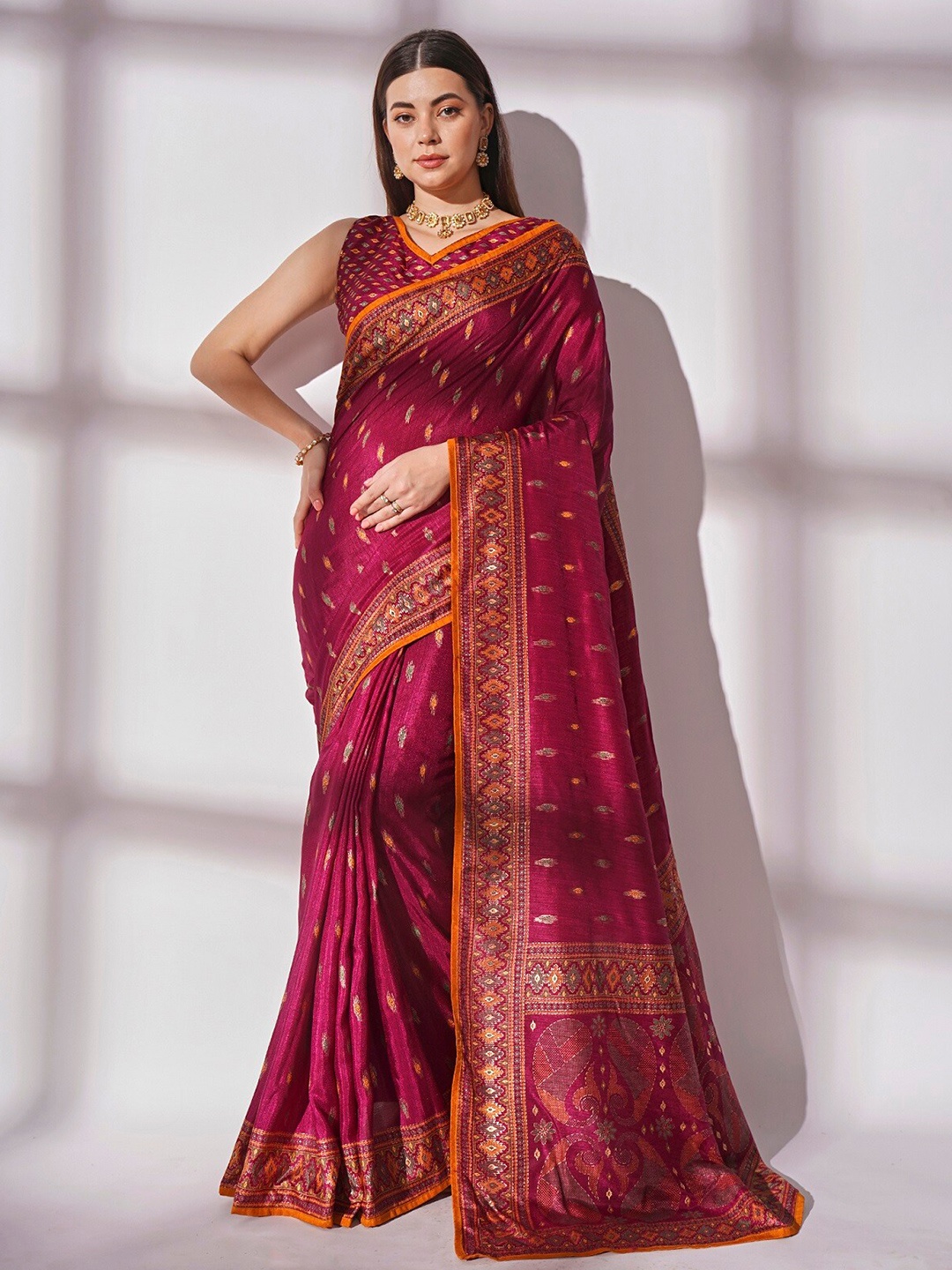 

Mitera Purple & Orange Ethnic Motifs Printed Saree