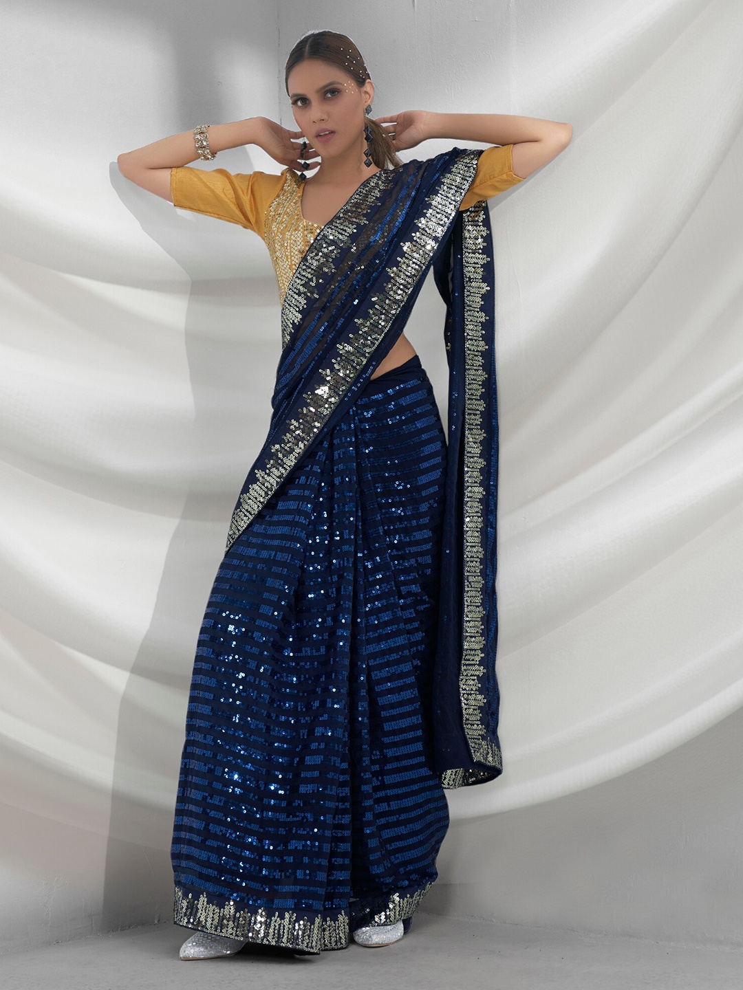

Mitera Blue & Gold-Toned Sequinned Pure Georgette Saree