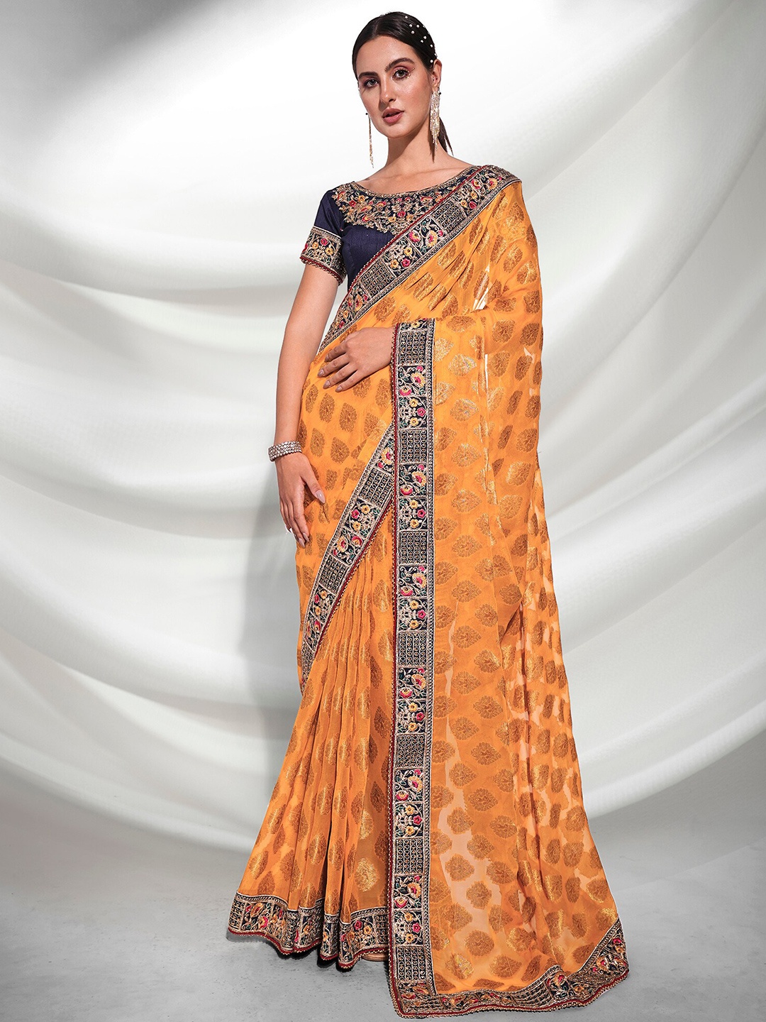 

Mitera Mustard Woven Design Embroidered Saree