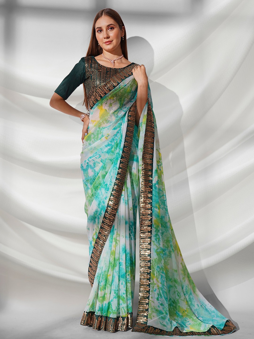 

Mitera Sea Green Embellished Sequinned Pure Georgette Saree