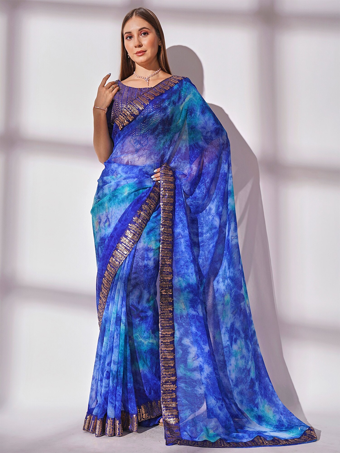 

Mitera Tie and Dye Sequinned Pure Georgette Saree, Turquoise blue