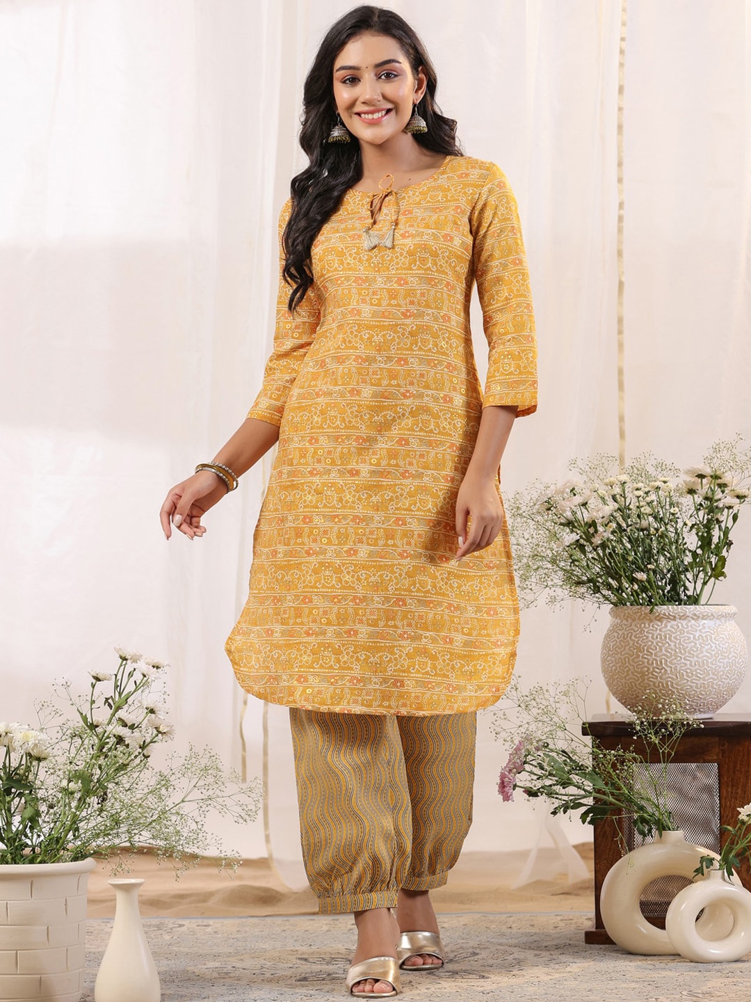 

Anubhutee Bandhani Printed Tie-Up Neck Regular Kurta With Salwar, Yellow
