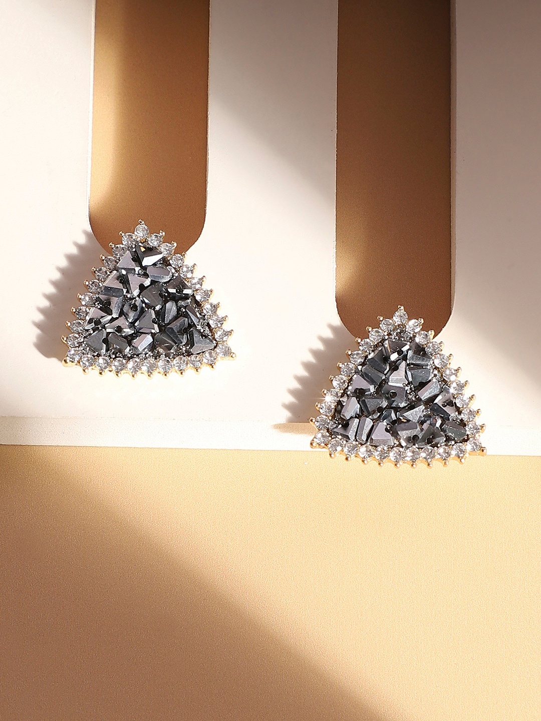

SOHI Silver-Plated Contemporary Stud Earrings