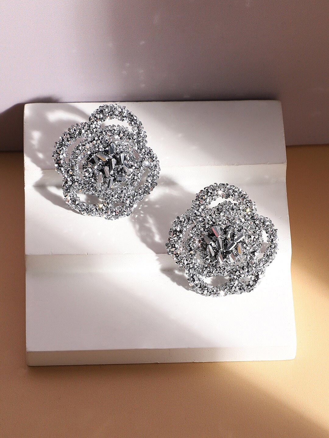 

SOHI Silver-Plated Contemporary Stud Earrings