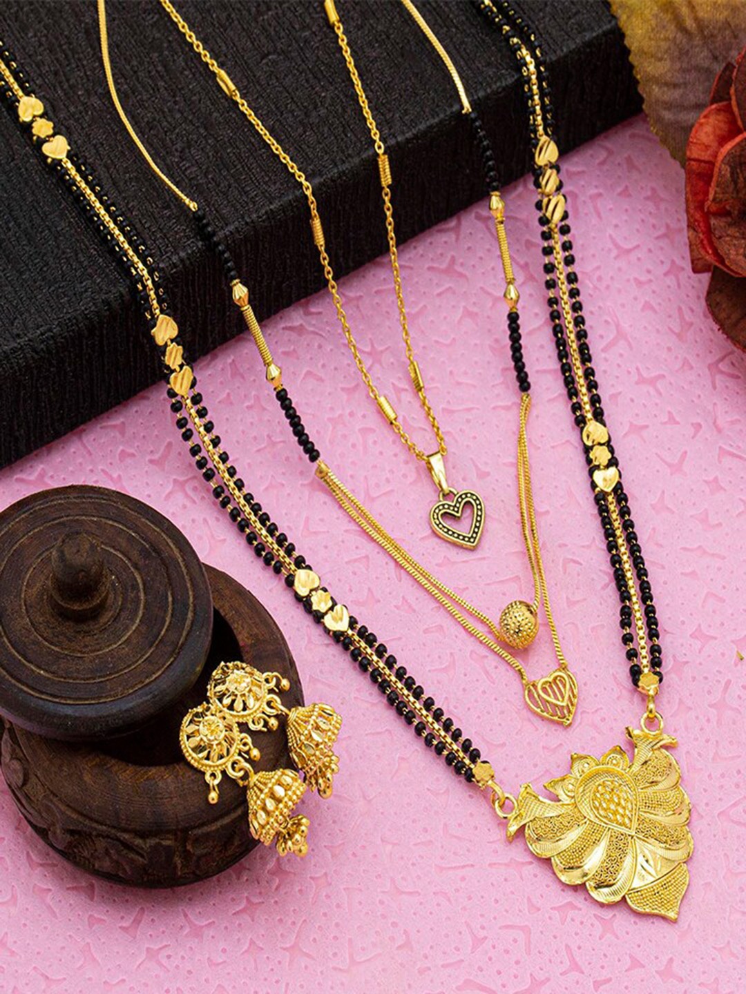 

Ramdev Art Fashion Jwellery Set Of 4 Gold-Plated Mangalsutra With Jumkhas