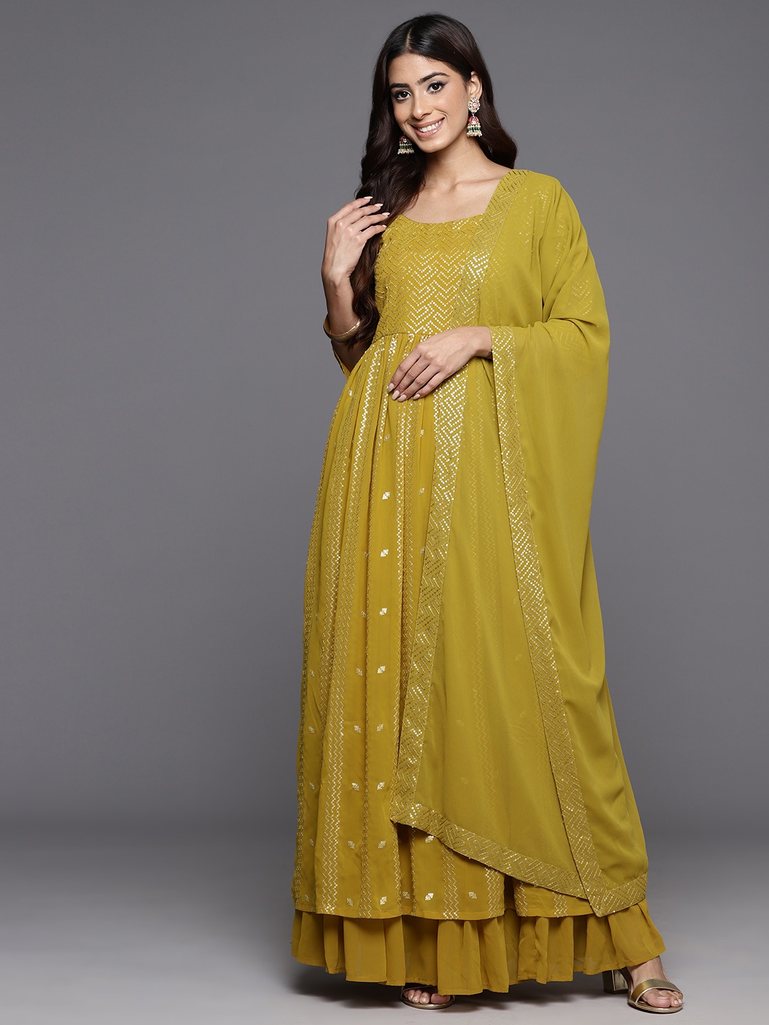 

Libas Women Embroidered Pleated Sequinned Kurta with Palazzos & With Dupatta, Mustard