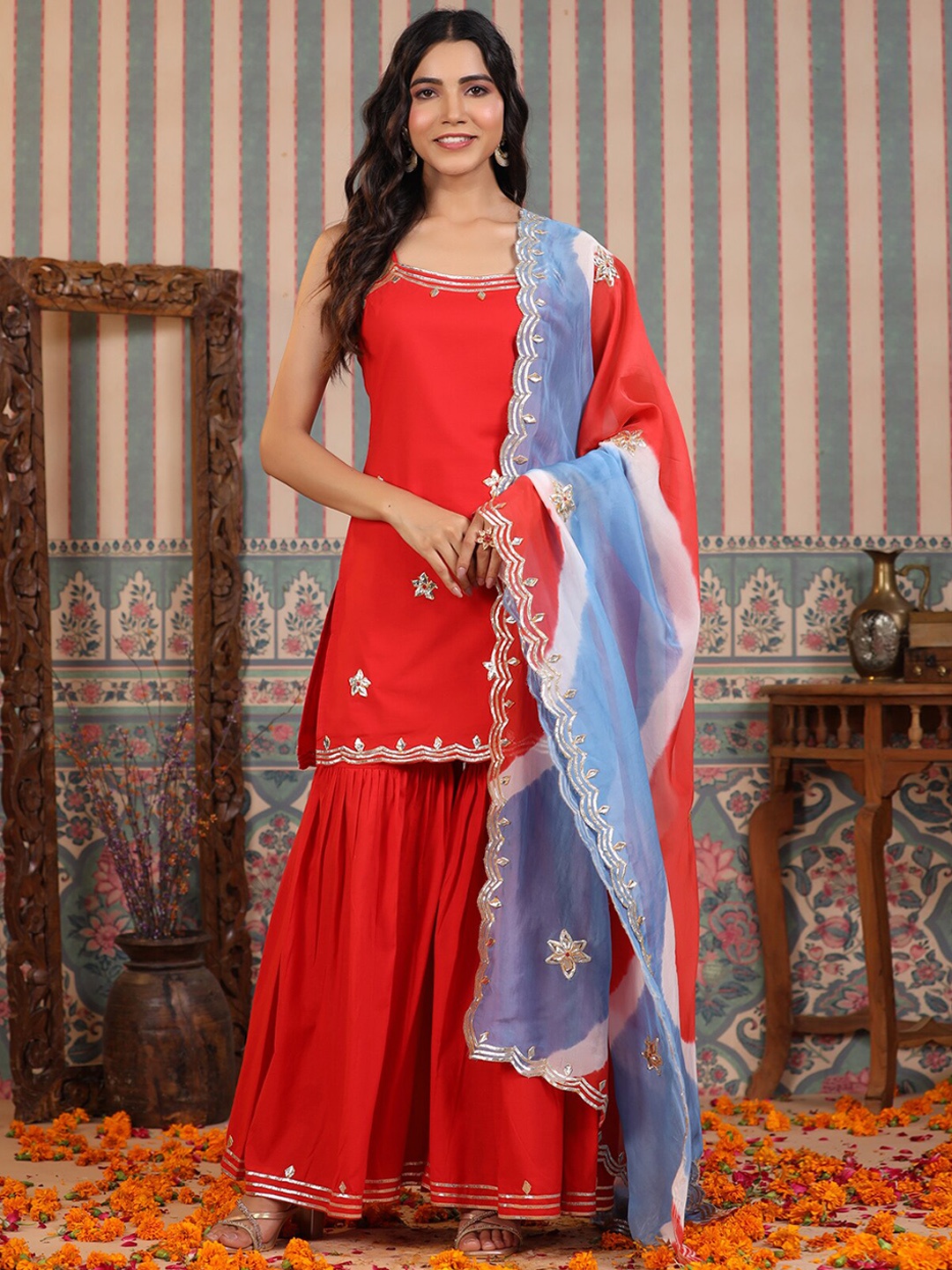 

Rangeelo Embellished Sleeveless Regular Straight Kurta with Sharara & With Dupatta, Red