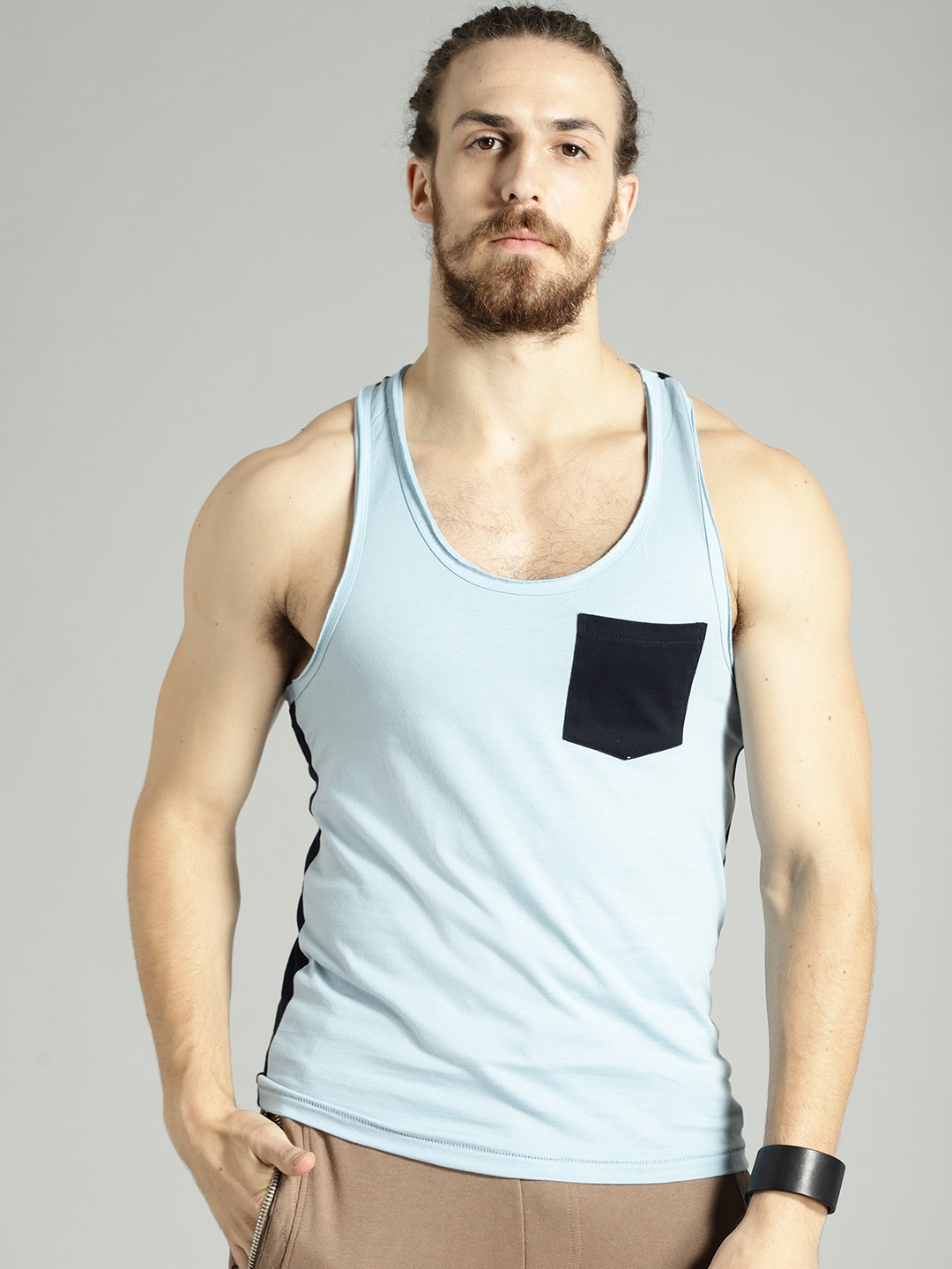 

Roadster Time Travlr Men Blue Sleveless Pure Cotton T-shirt with Raw Edges