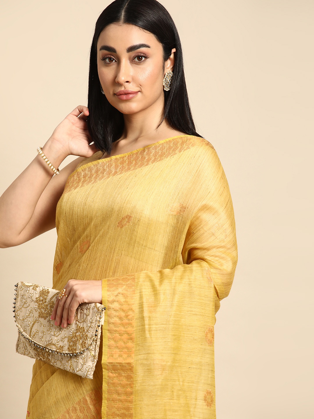 

swatika Woven Design Zari Silk Blend Muga Saree, Yellow