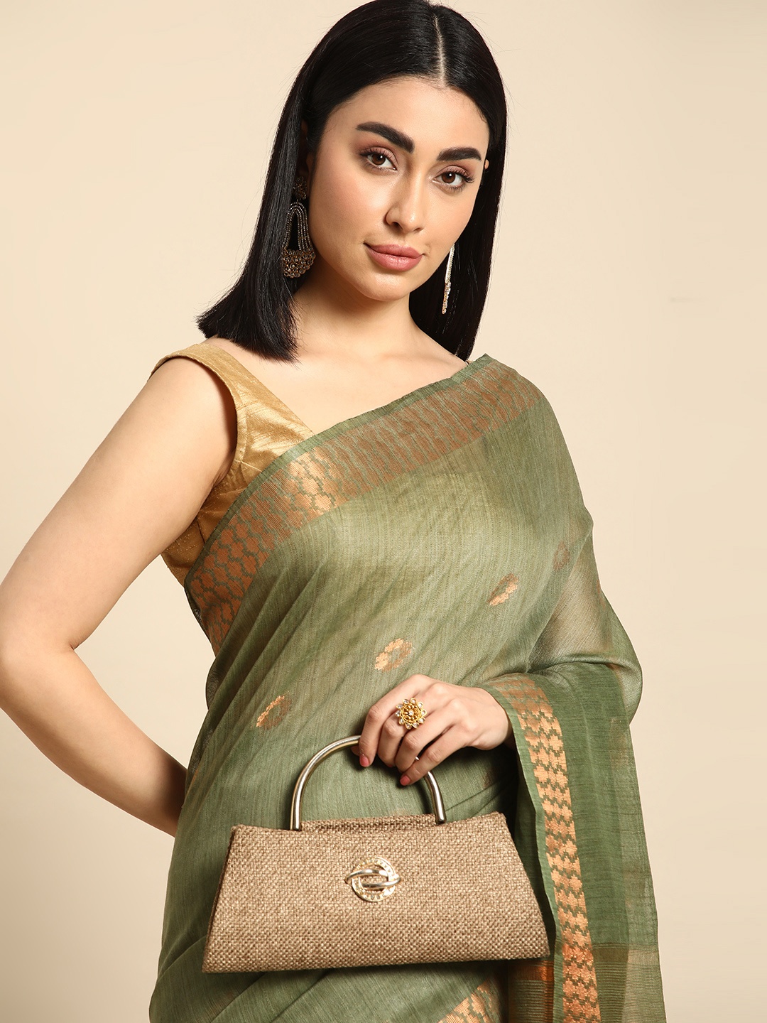 

swatika Woven Design Zari Silk Blend Muga Saree, Green