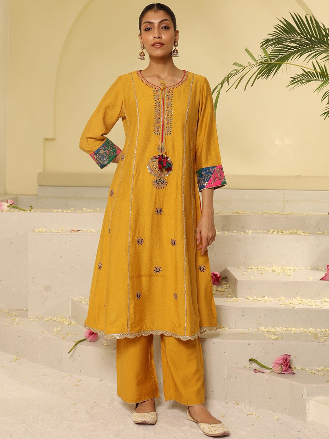 

Lakshita Floral Embroidered Tie-Up Neck Panelled Sequinned Kurta With Trousers, Mustard