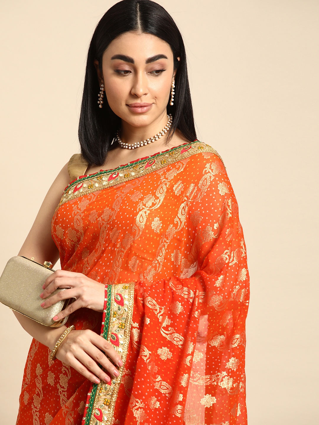 

Mitera Ethnic Motifs Zari Poly Georgette Bandhani Saree, Orange