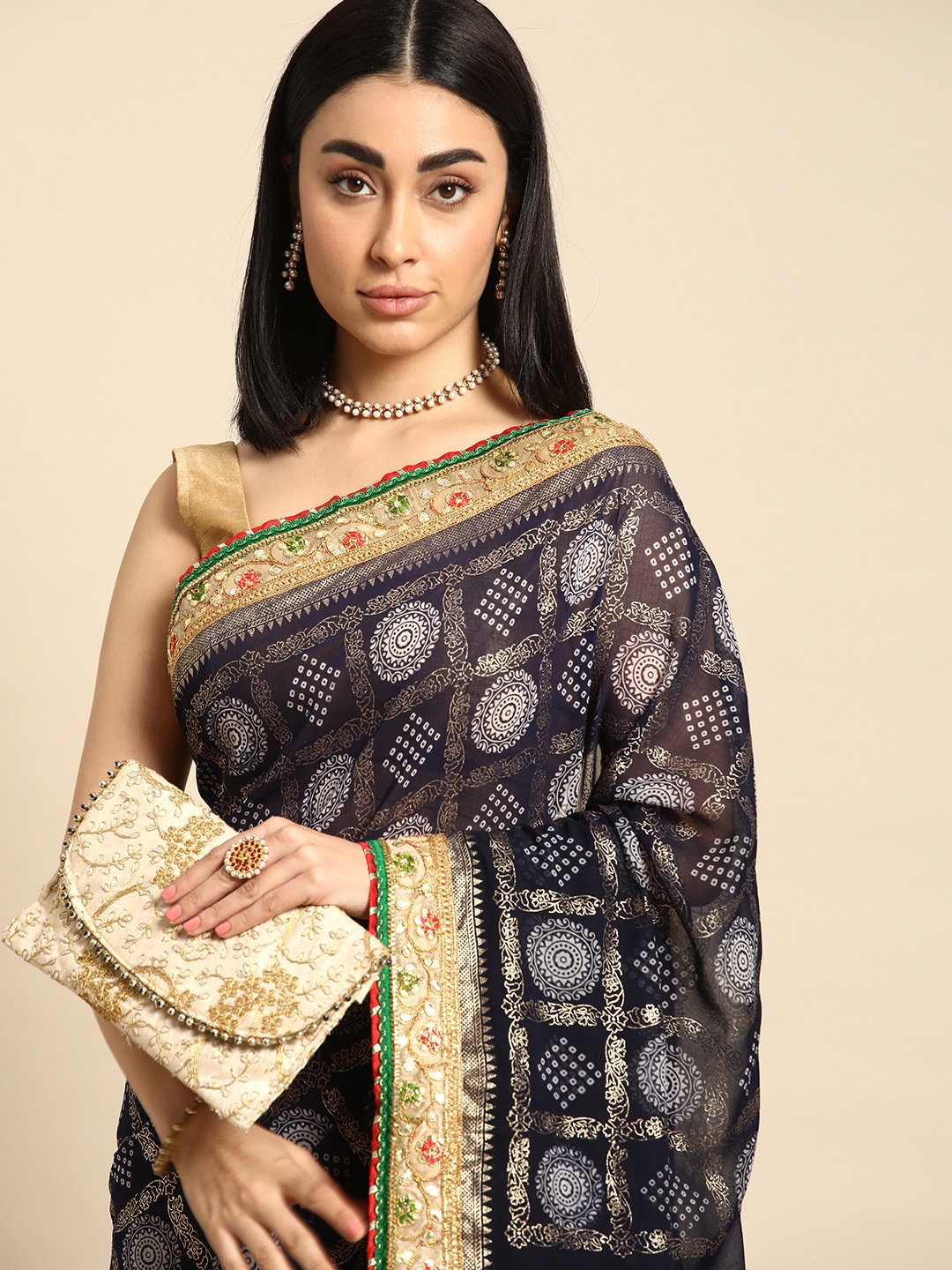 

Mitera Zari Poly Georgette Bandhani Saree, Navy blue