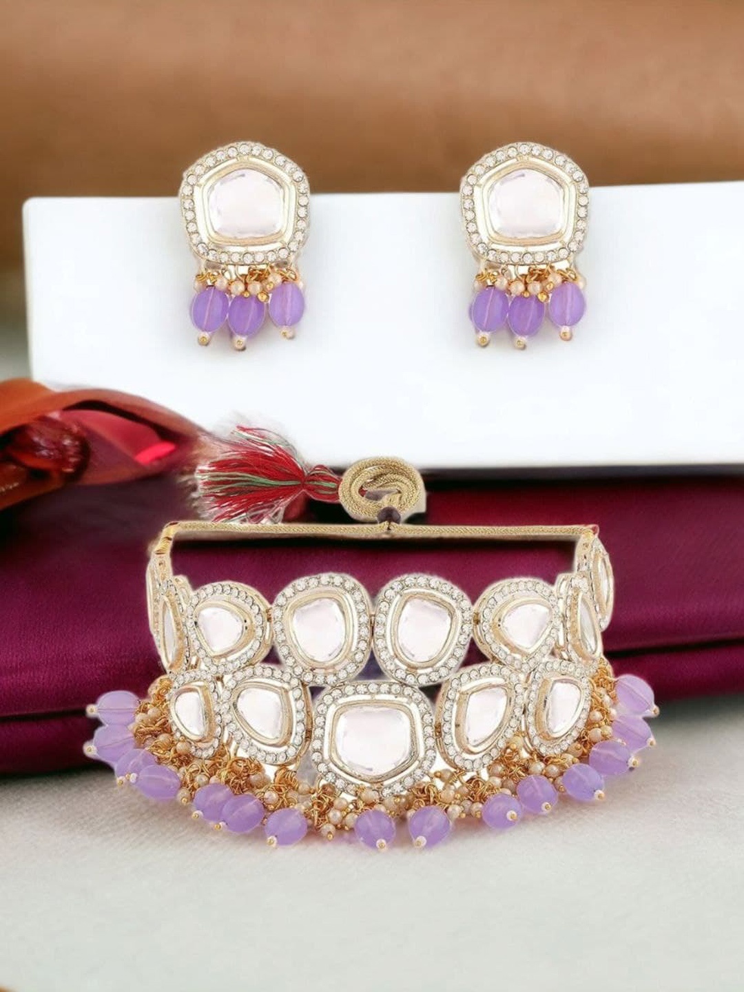 

Anouk Gold Plated Kundan Studded & Beaded Jewellery Set