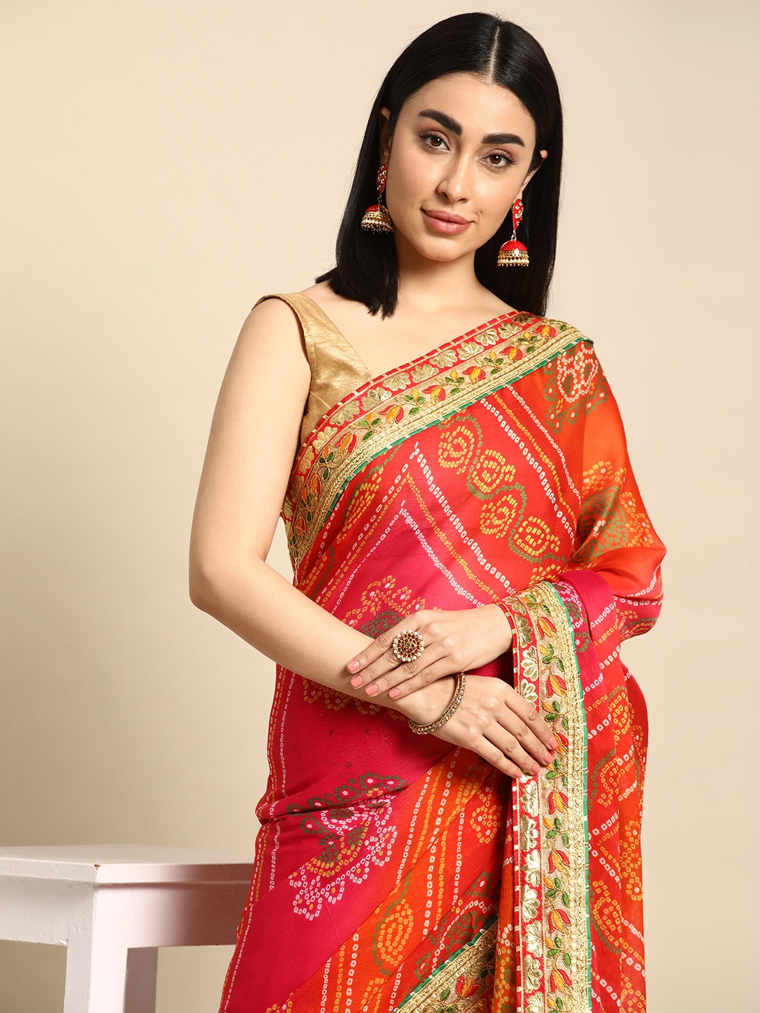 

Mitera Gotta Patti Poly Georgette Bandhani Saree, Red