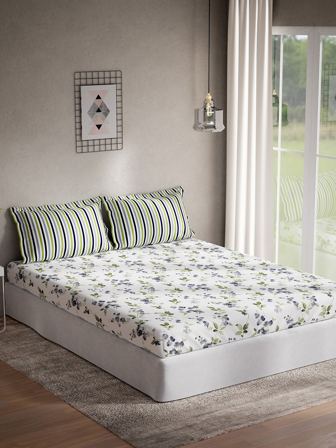 

DDecor Blue & White Floral Cotton 144 TC Queen Bedsheet With 2 Pillow Covers