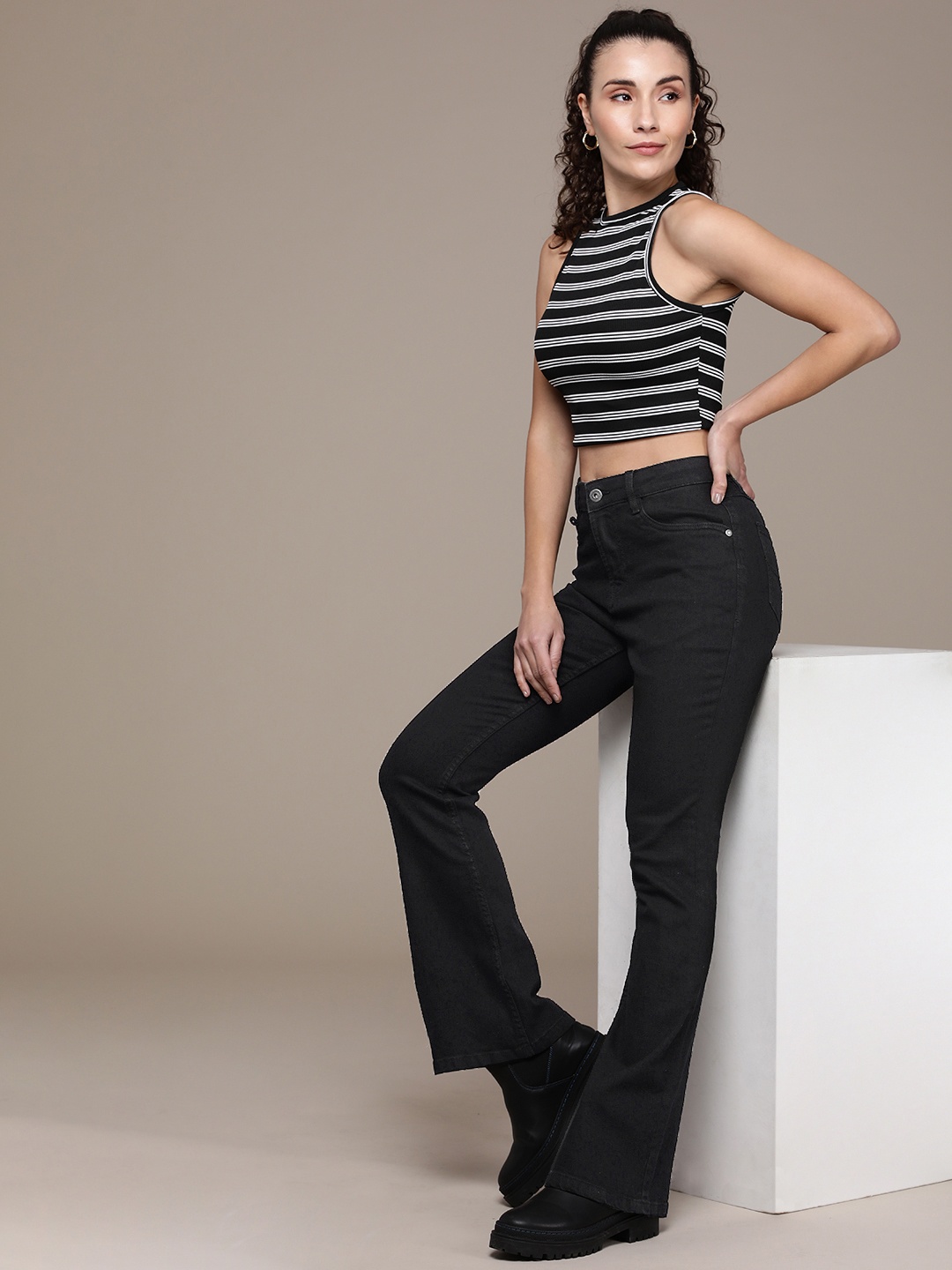 

The Roadster Lifestyle Co. Women Flared High-Rise Stretchable Jeans, Black