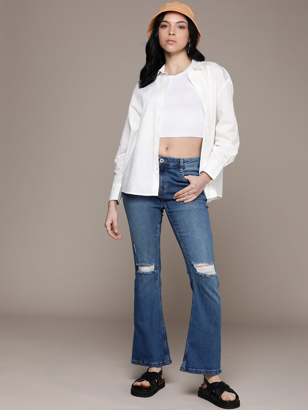 

The Roadster Life Co. Women Skinny Flared Fit Distressed Light Fade Stretchable Jeans, Blue