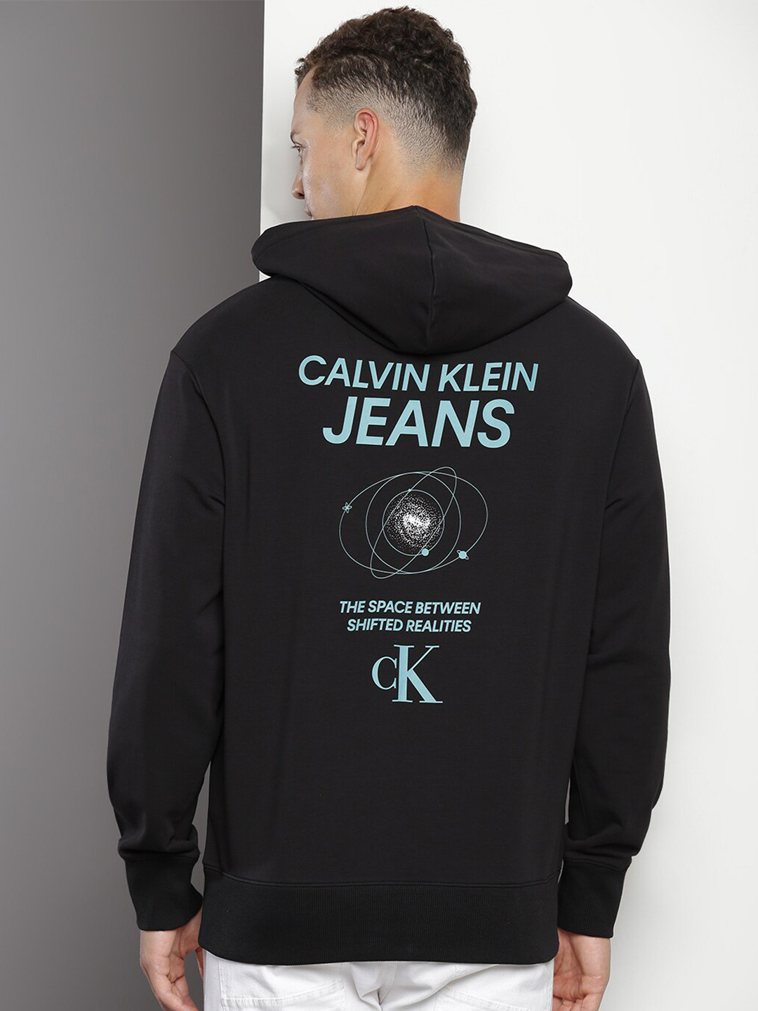 

Calvin Klein Jeans Typographic Printed Hooded Cotton Pullover Sweatshirt, Black