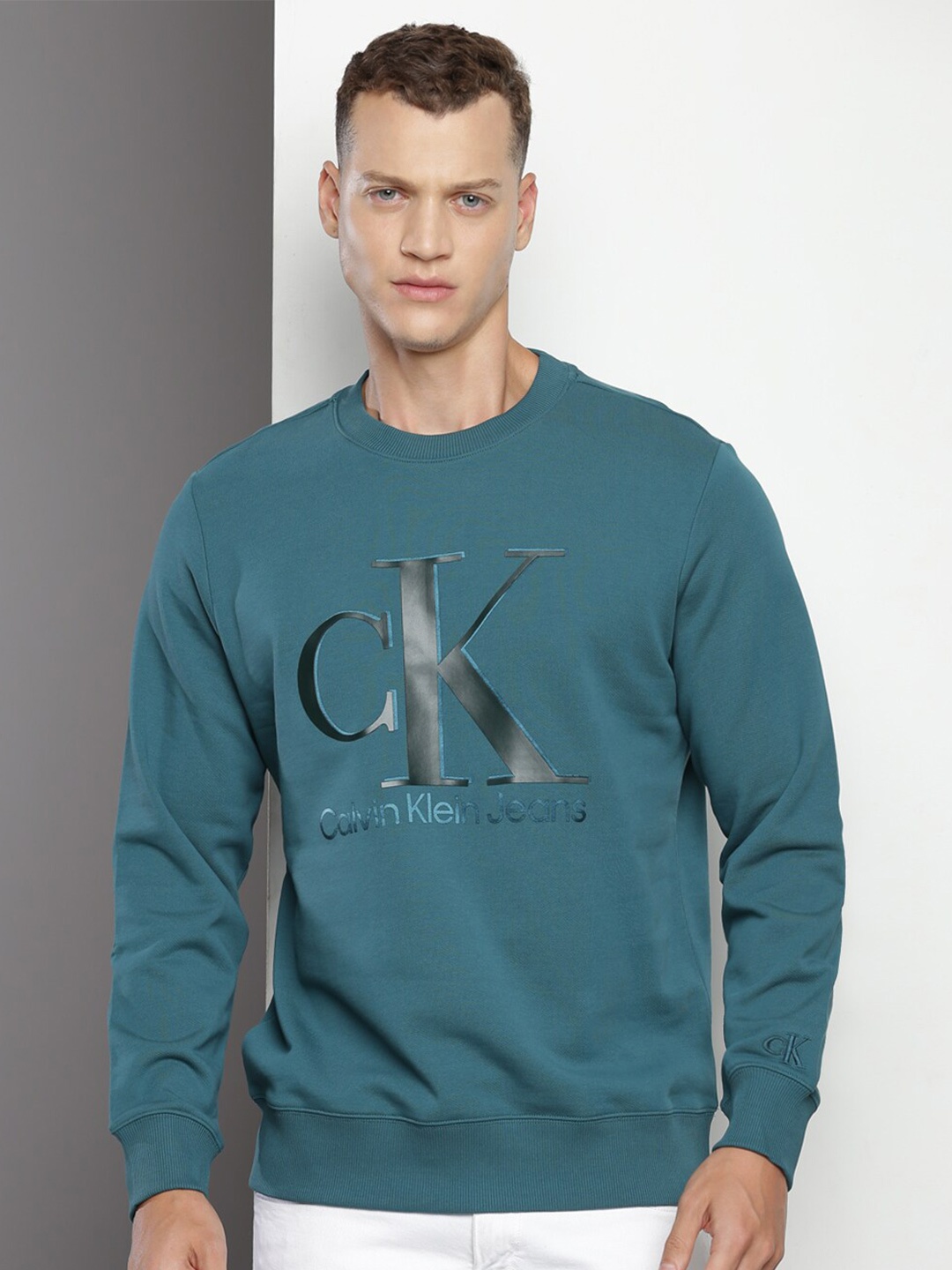 

Calvin Klein Jeans Typographic Printed Cotton Pullover Sweatshirt, Teal