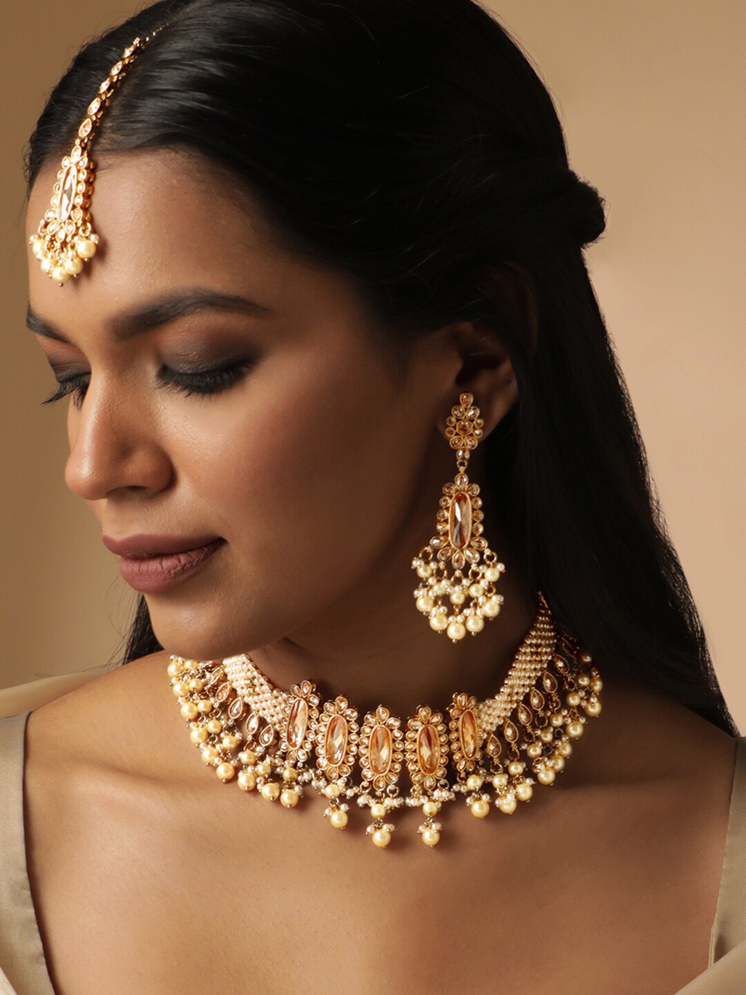 

Rubans 22K Gold Plated Peach & White Kundan Studded Multi-Strand Pearl Beaded Choker Set