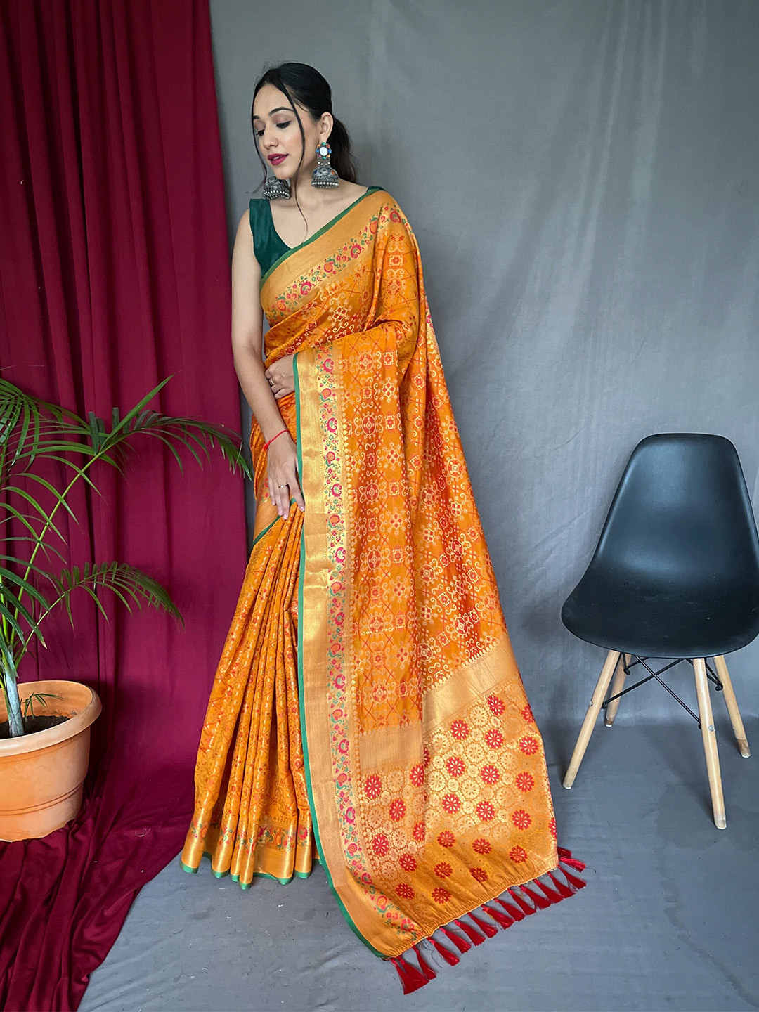 

Munir Woven Design Silk Blend Patola Saree, Yellow