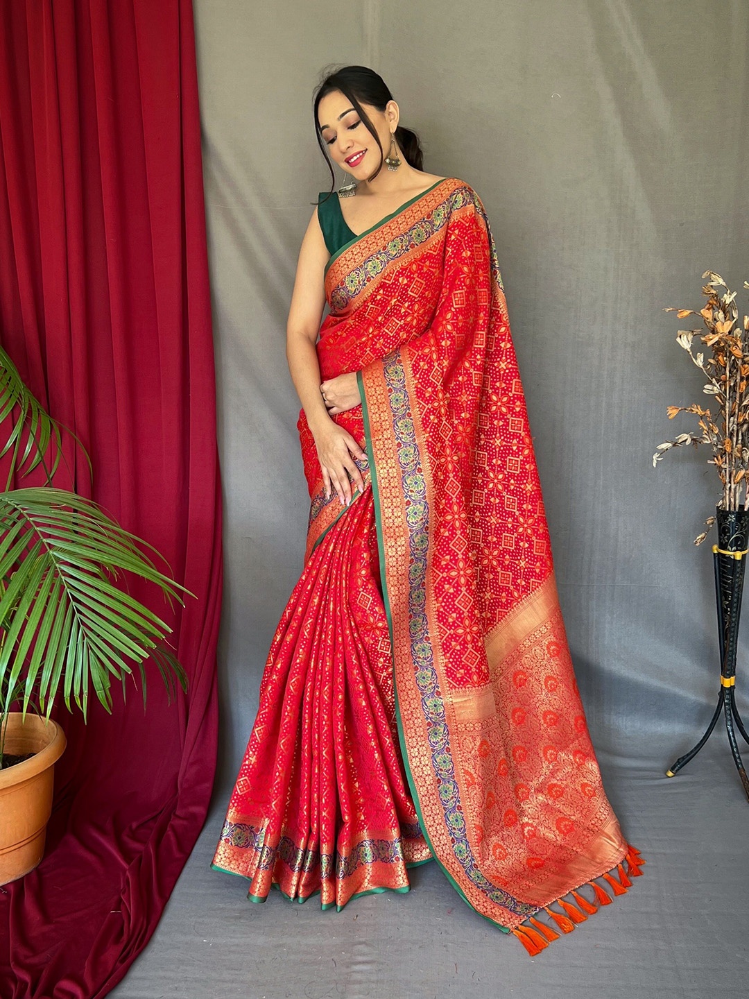 

Munir Ethnic Motifs Woven Design Zari Bandhani Saree, Red