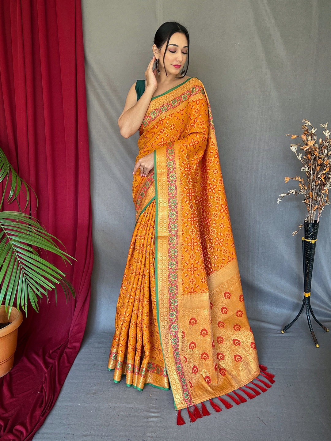 

Munir Ethnic Motifs Woven Design Zari Bandhani Saree, Yellow